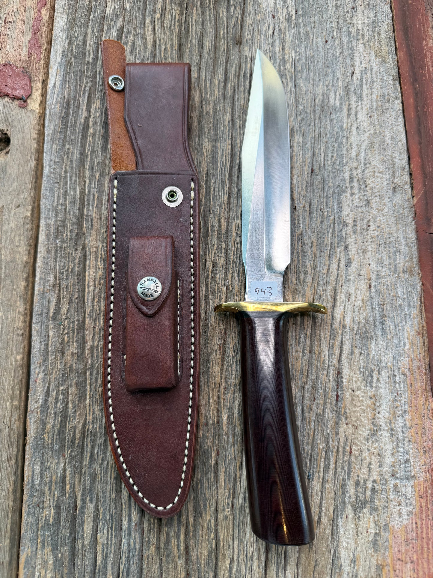 New in Paper Randall Model 1-7 Maroon Micarta Brass Hilt, Natural end, single black spacer, carbon steel.