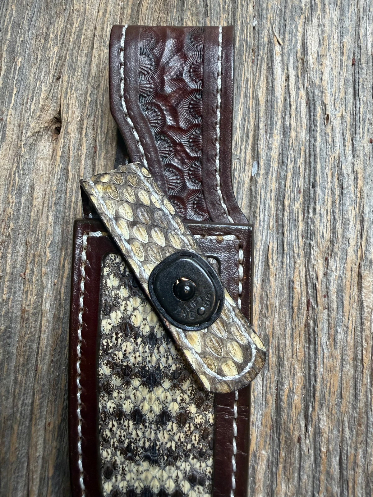 Randall Model 28 sheath with an Eastern Diamondback RattleSnake skin from Treeman Sheaths. Hand tooled belt loop, canteen snap. Vibrant colors and one of the hardest skins to source.