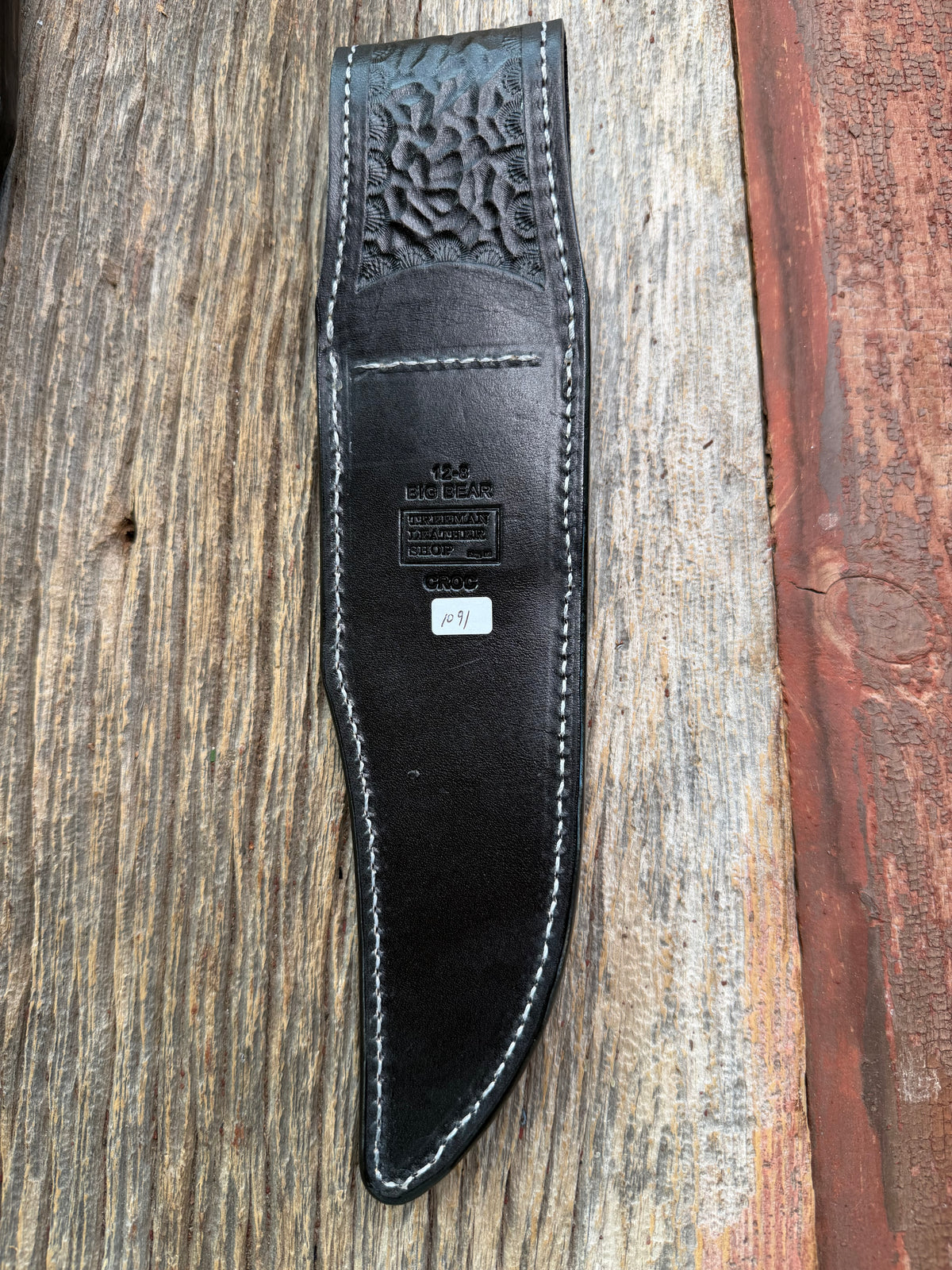 New Randall Model 12-8 Sheath in Exotic Black Matte Crocodile skull from Treeman with a Black Canteen snap. White thread deviated stitching on black leather..Killer sheath.