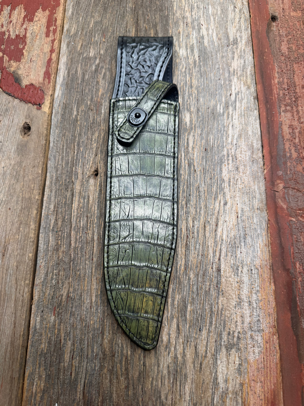 New Randall Model 12-9  Sheath in Exotic Army Green Matte Crocodile from Treeman with the newest Black Canteen snap. Killer sheath.