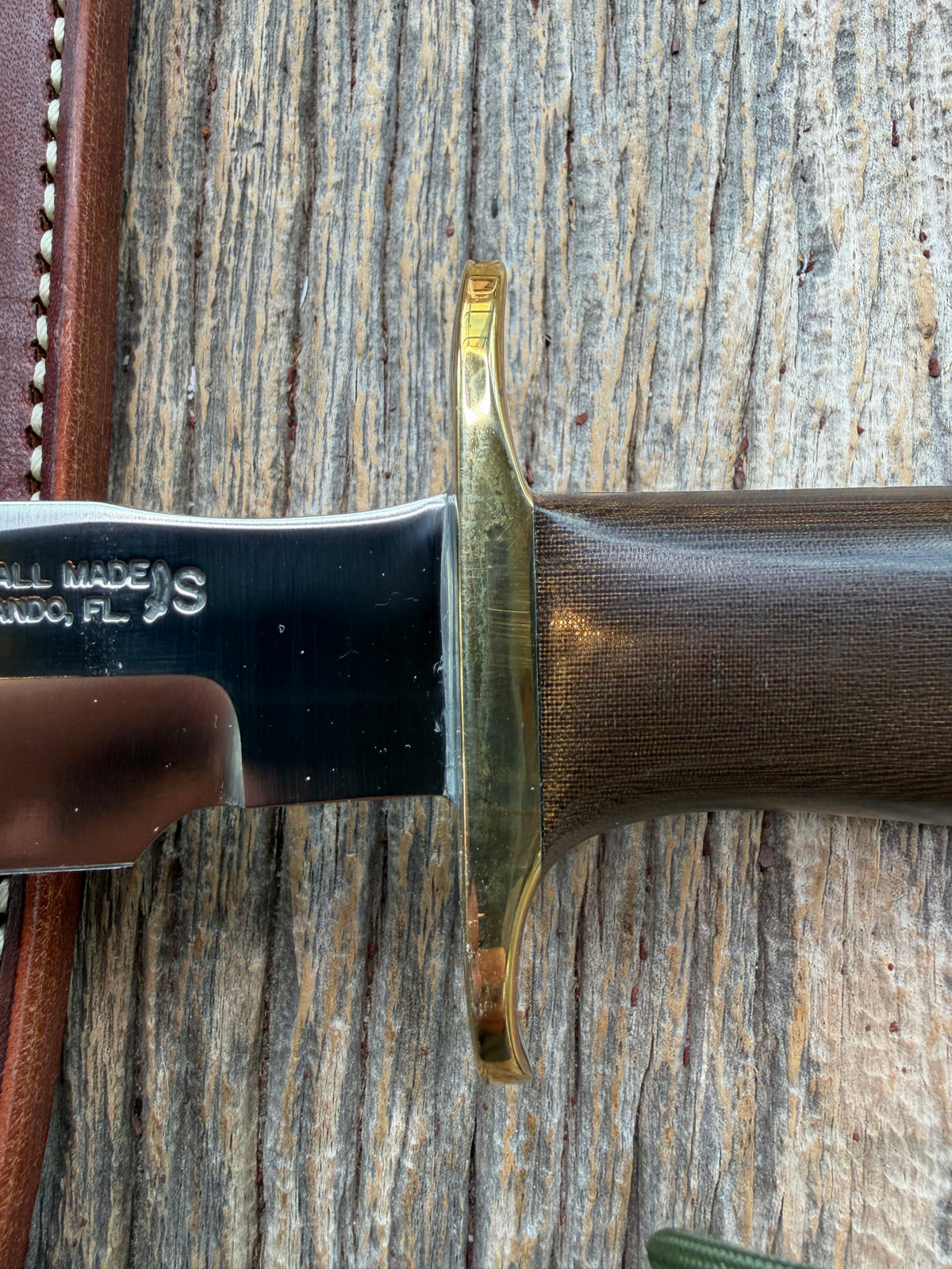 Nice Randall Model 16 SP#1 Special fighter with a Brown Micarta handle. SS blade, brass hilt. Lanyard. Brown leather sheath.