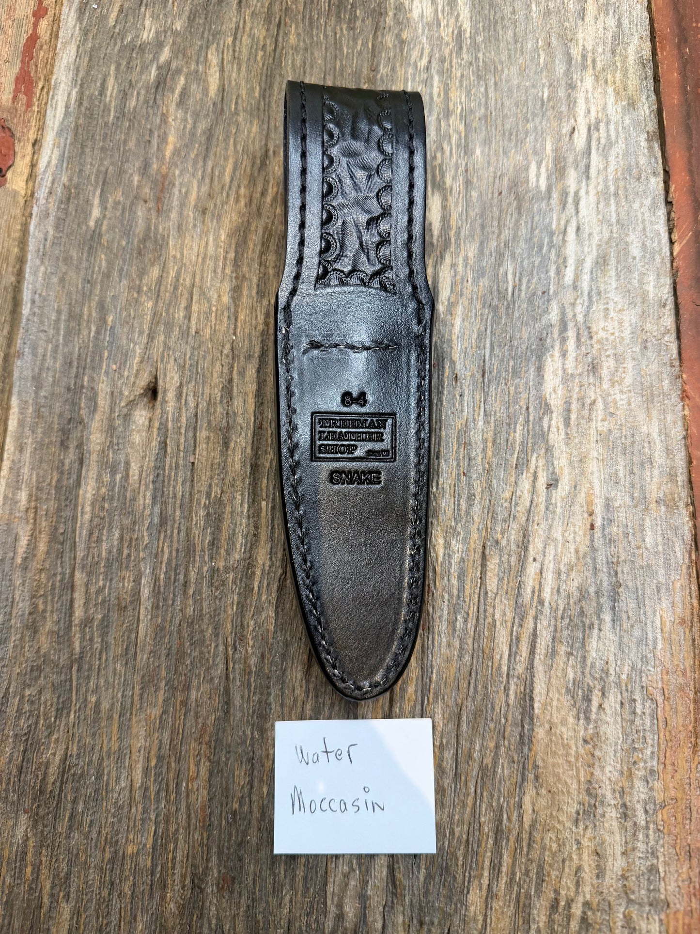 Randall Model 8-4 Sheath in Exotic Water Moccasin from Treeman Sheaths. Tremendous colors on this one.