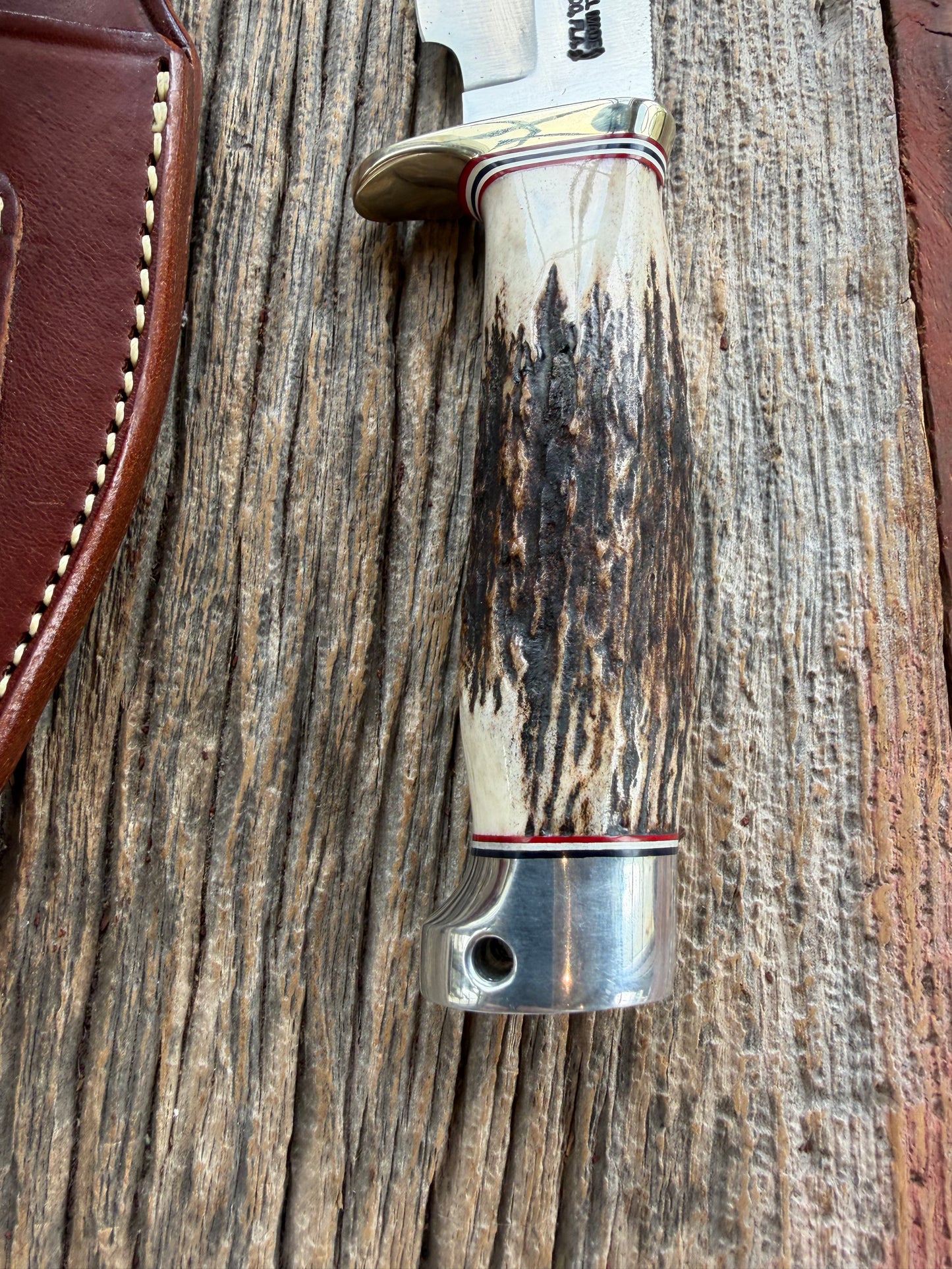Nice Randall Model 19-4 with a Gnarly Stag. Nickel silver Single Hilt and Aluminum crows beak Butt plate. RWB spacers.