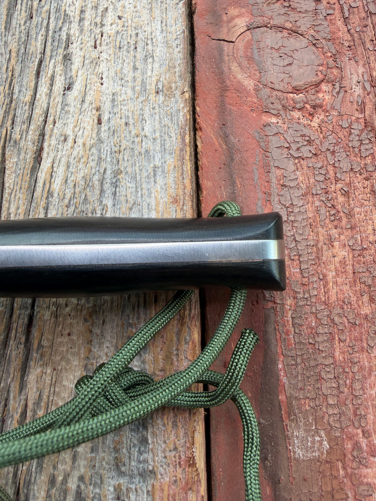 Nice Randall Model Combat Companion in Black Micarta. SS blade, brass hilt. Lanyard and paracord, Brown leather sheath.