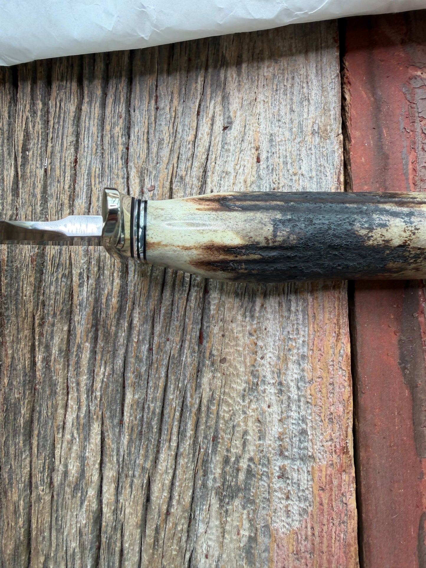 New in Paper Randall Made Knife Model 1-7 Darkened Stag , Stainless, Black and Aluminum spacers, Nickel Silver Hilt, Aluminum butt cap.