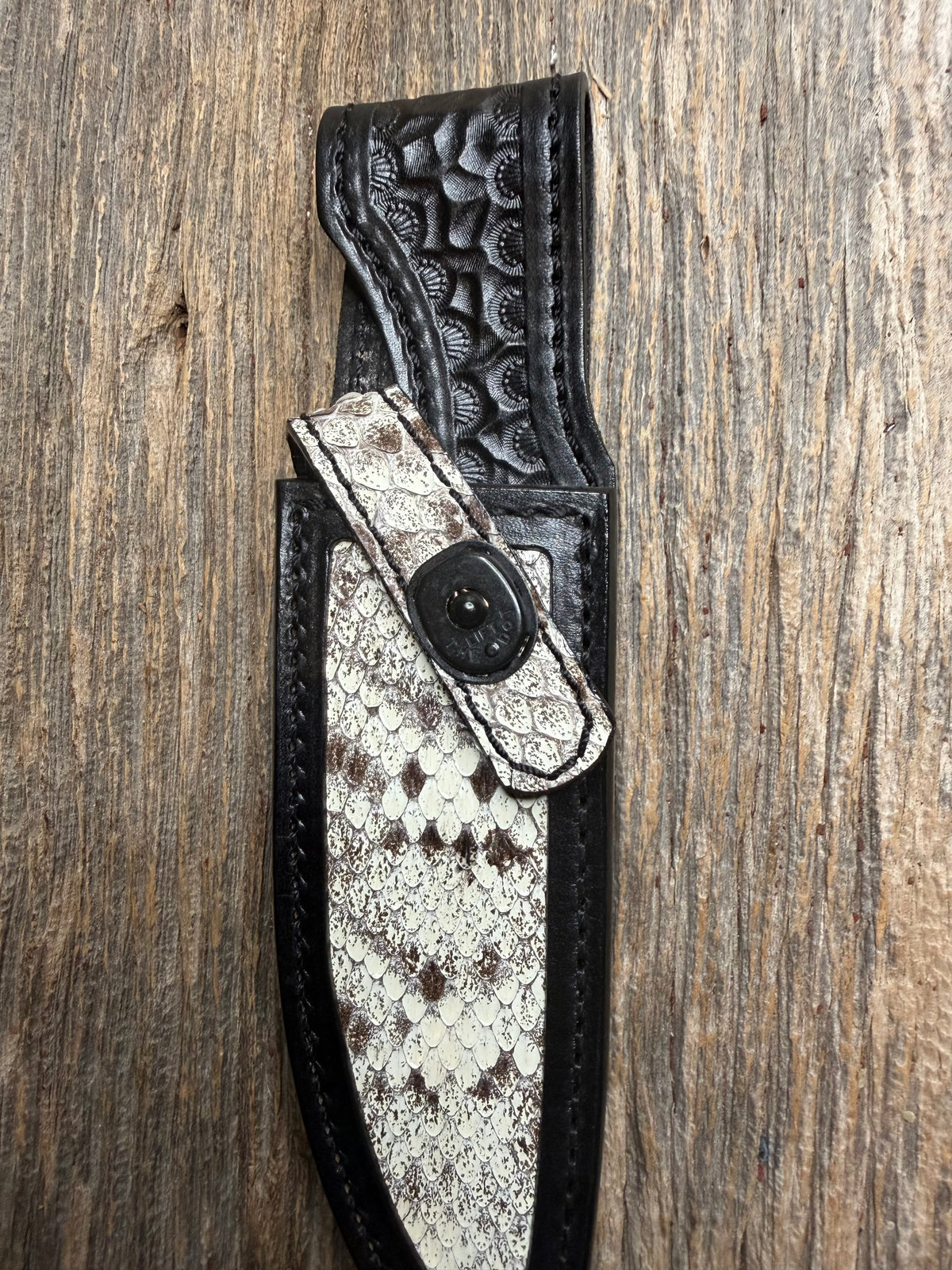 Randall Model Combat Companion sheath with an Eastern Diamondback RattleSnake skin from Treeman Sheaths. Hand tooled belt loop, canteen snap. One the hardest skins to source.