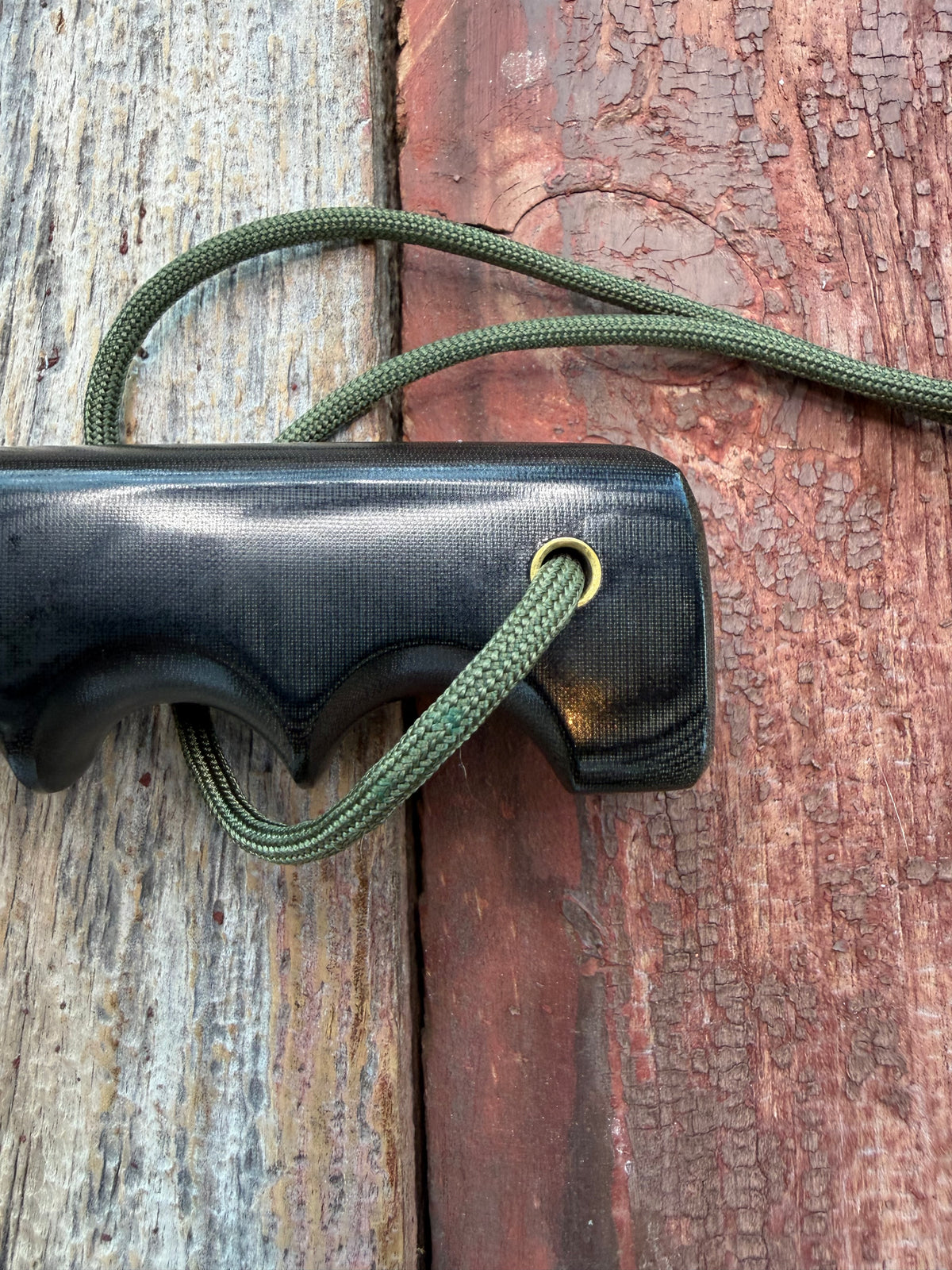 Nice Randall Model 16-7 with a Black  Micarta handle. SS blade, brass hilt. Lanyard. Brown leather sheath.