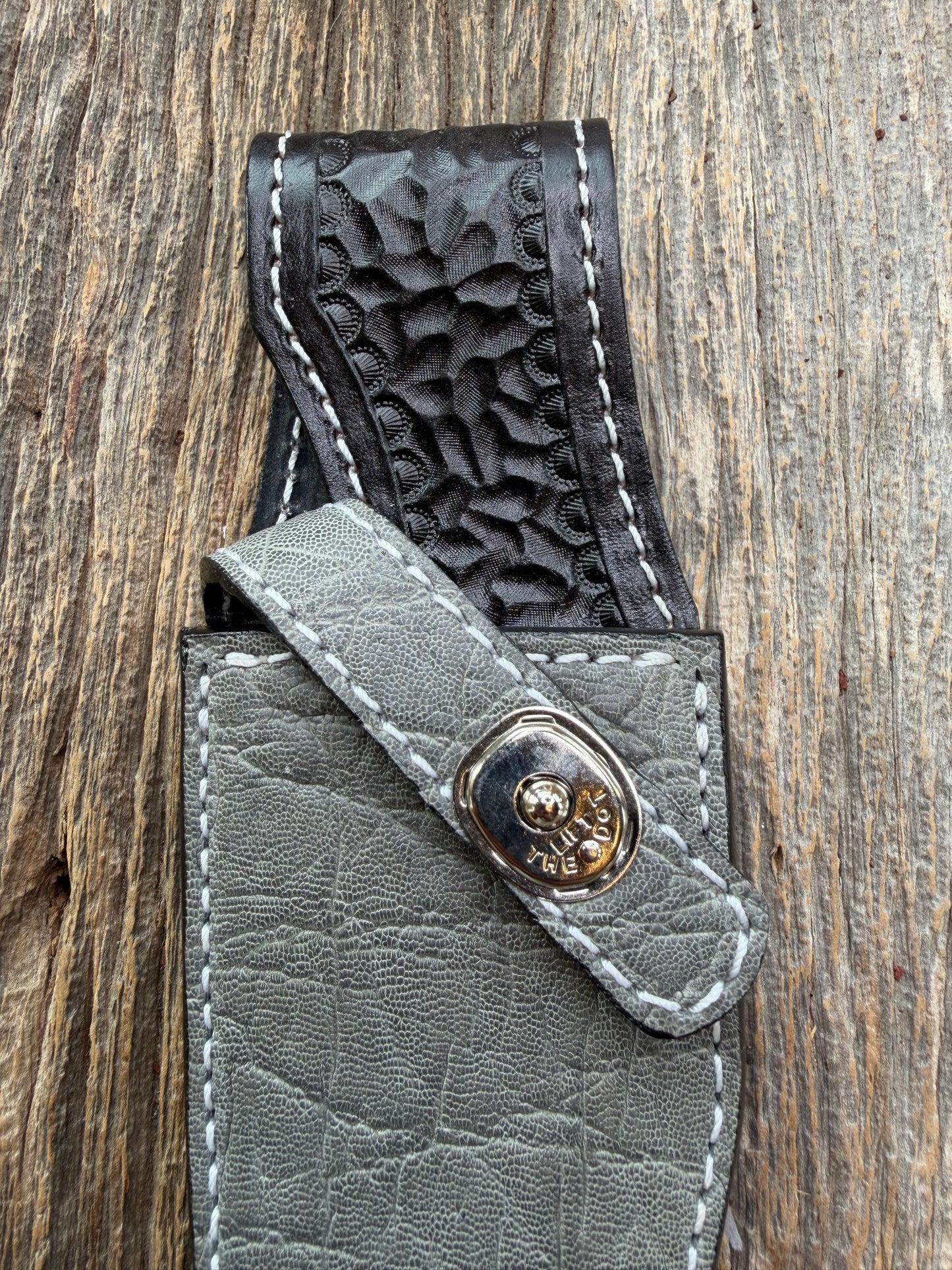 New Randall Model 19-5 Sheath in Exotic thick and textured Grey Elephant Hide on black leather from Treeman with a silver Canteen snap. Hand tooled belt loop. Killer sheath.