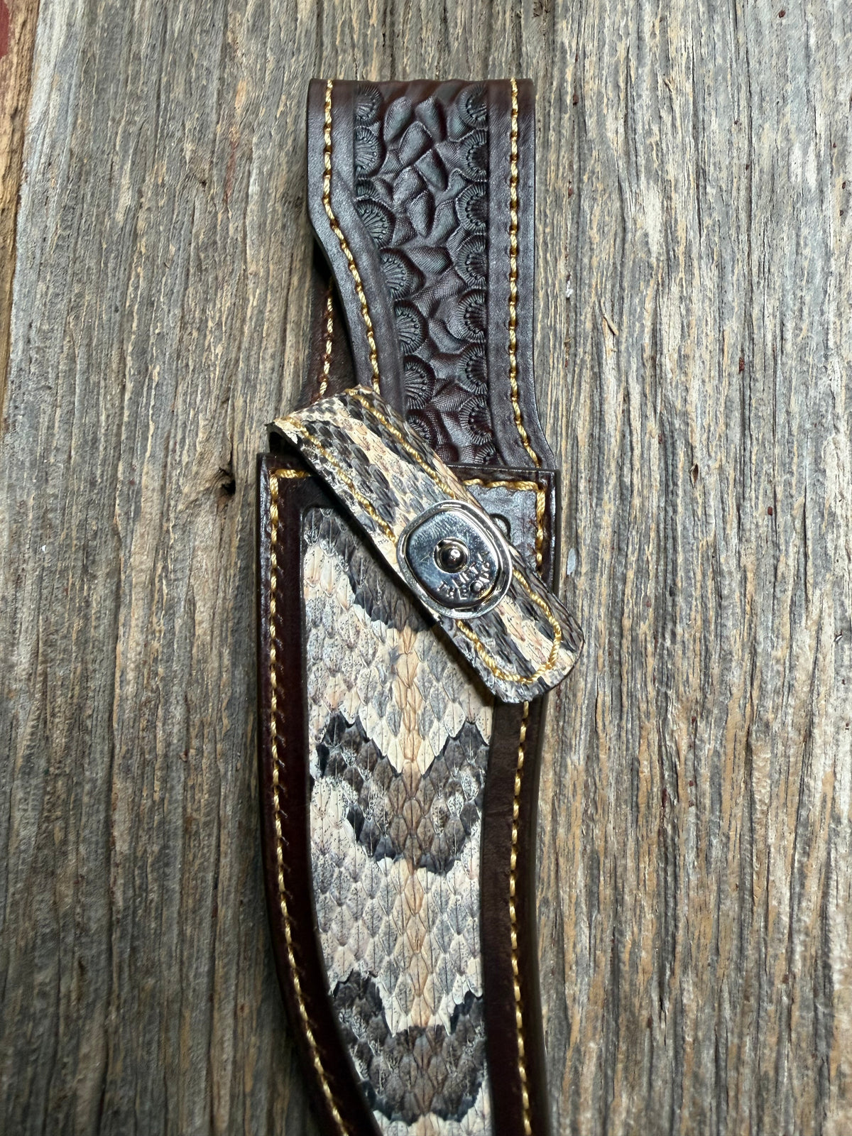 Randall Model 27 sheath with a Canebrake RattleSnake skin from Treeman Sheaths. Vibrant colors and along side Copperheads the hardest skin to source.