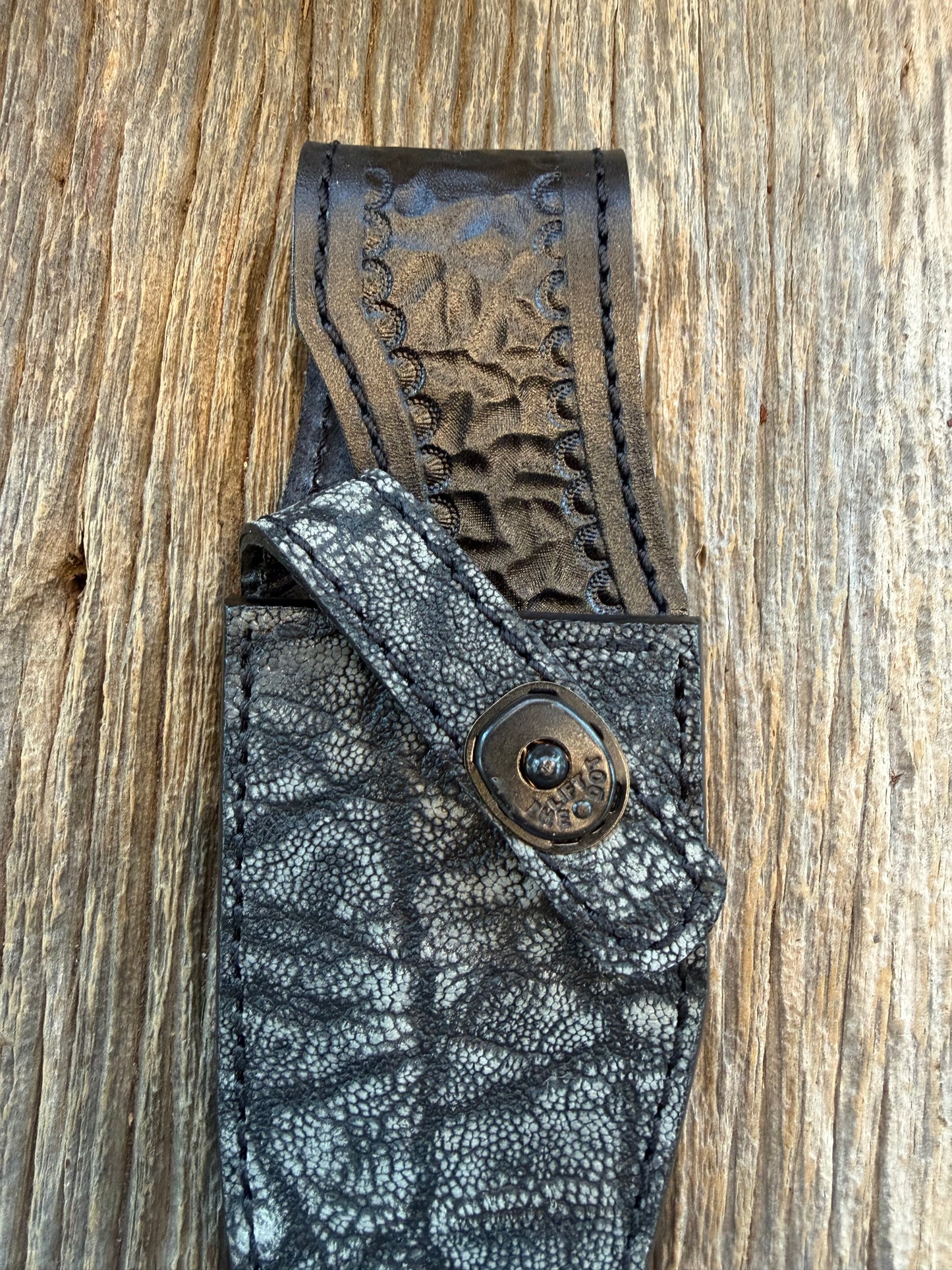 Randall Model 19-5 Sheath in Exotic African Elephant Ear from Treeman Sheaths. Black and Grey pebble texture and the new black Canteen snap, phenomenal.