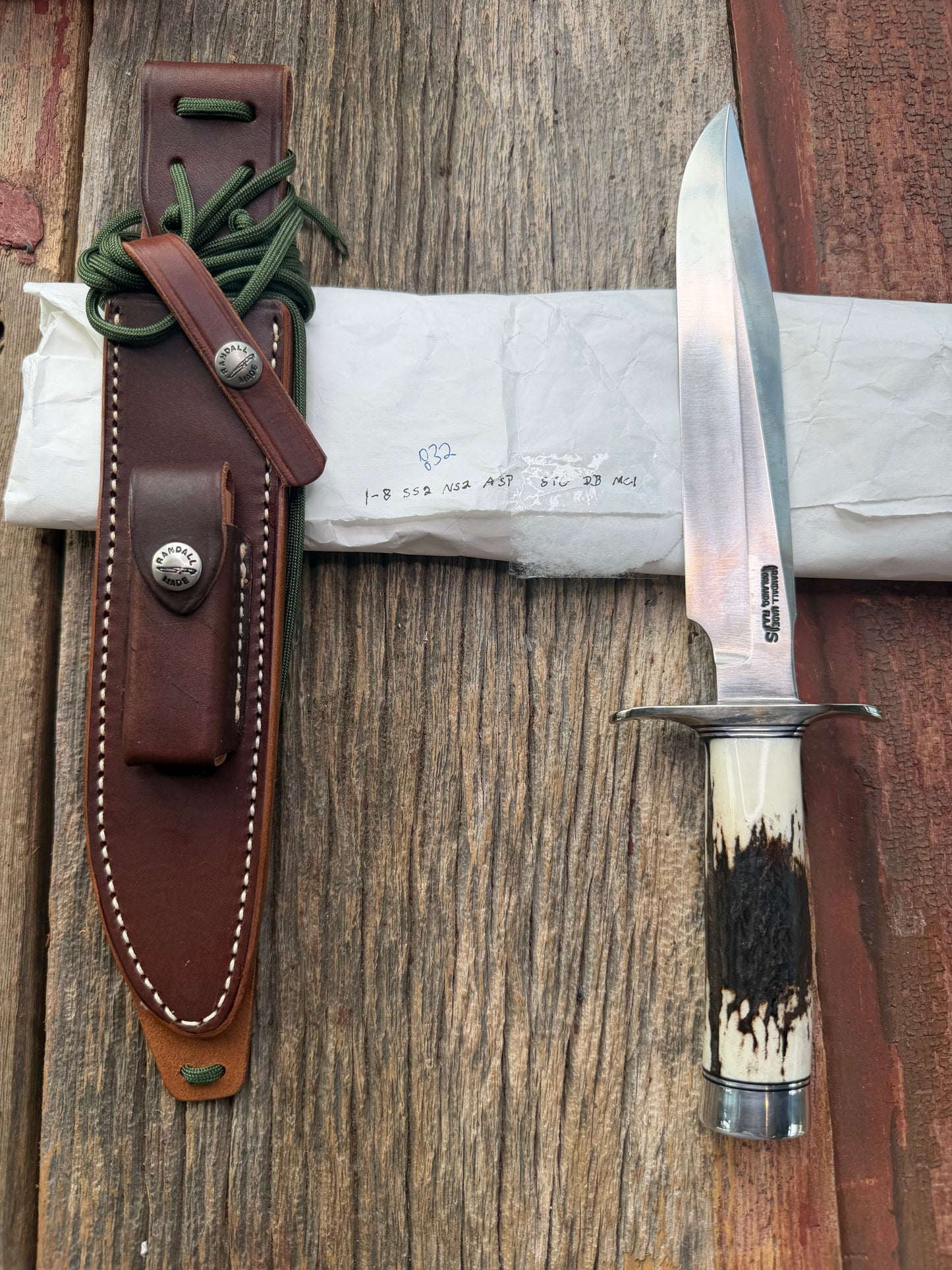 New in Paper Randall Made Knife Model 1-8 Stag , Stainless, Black and Aluminum spacers, Nickel Silver Hilt, Aluminum butt cap.