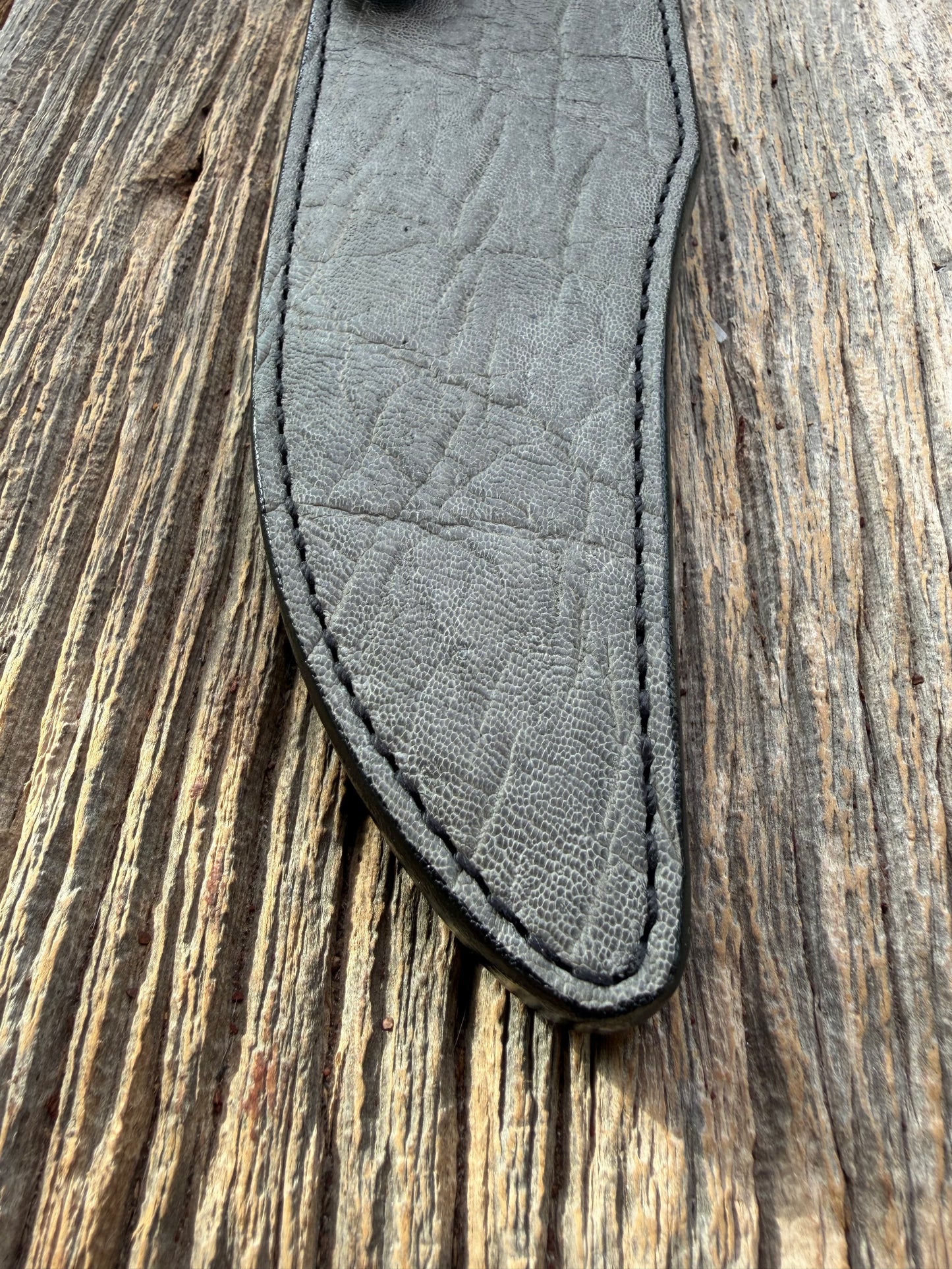 New Randall Model 12-8 Big Bear Sheath in Exotic thick and textured Grey Elephant Hide on black leather from Treeman with a black Canteen snap. Hand tooled belt loop. Killer sheath.
