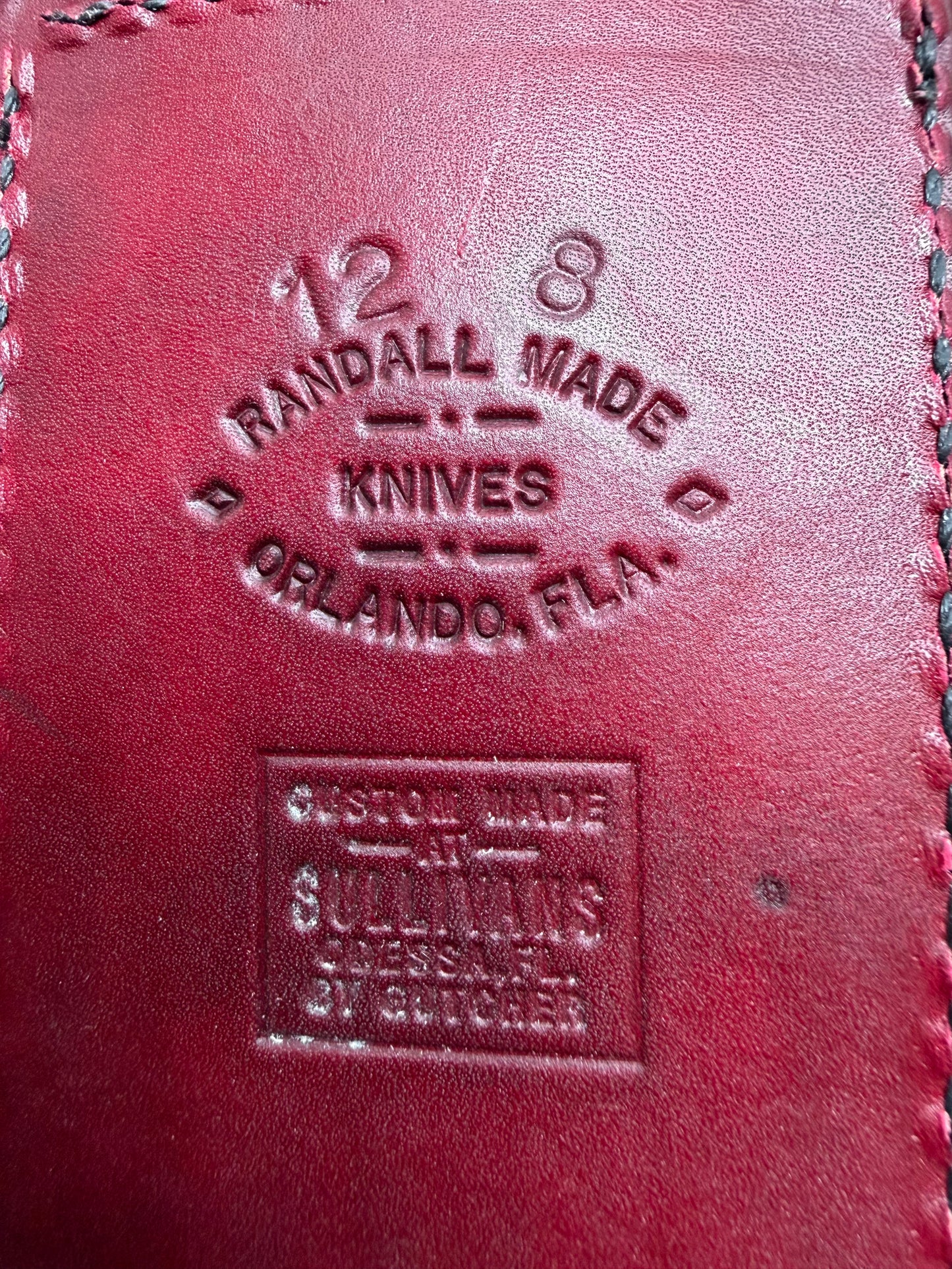 Randall Model 12-8 “Big Bear” sheath in Ox Blood Red stamped leather from Sullivans by Gutcher. Parquet window pattern, mesmerizing !!