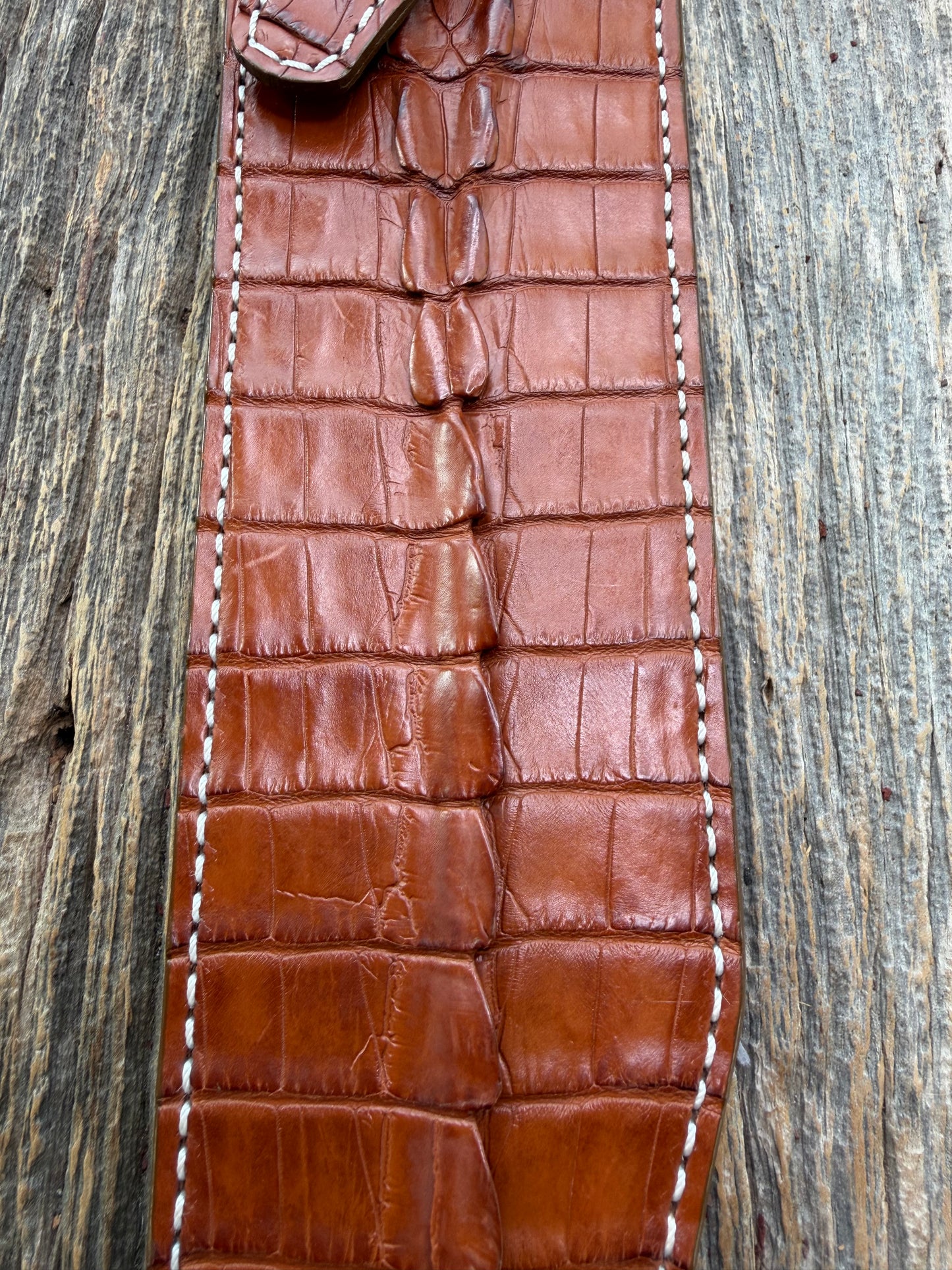 New Randall Model 12-11 Confederate Sheath in Exotic thick and textured Honey Crocodile skin ( tail portion) on brown leather from Treeman with a silver Canteen snap. Hand tooled belt loop. Killer sheath.