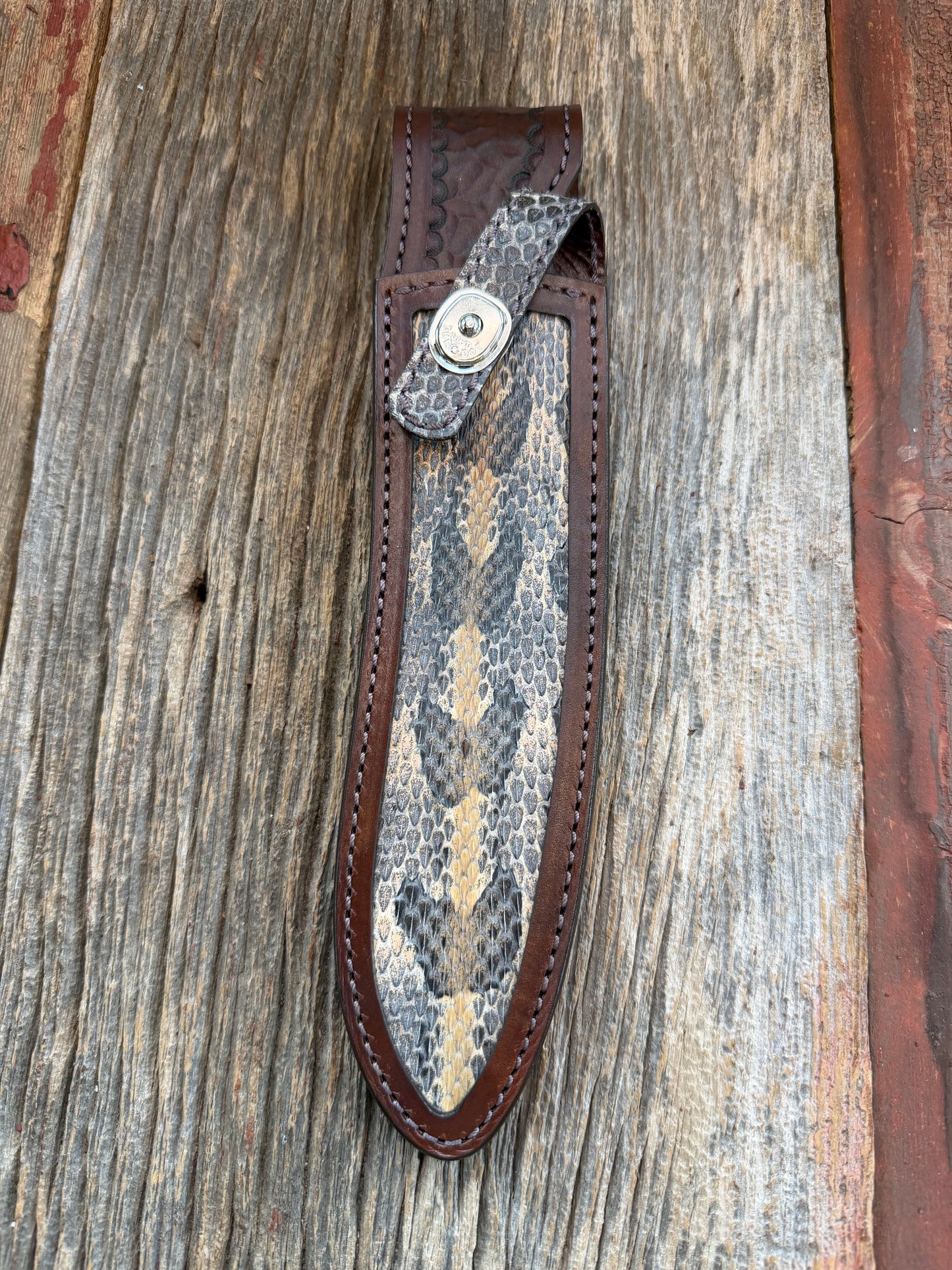Randall Model 12-11 and 12-8 Large and Small Sasquatch  pair in Exotic Canebreak RattleSnake. An absolute gem 1/1 pair from Treeman Sheaths. Tremendous colors on this one.