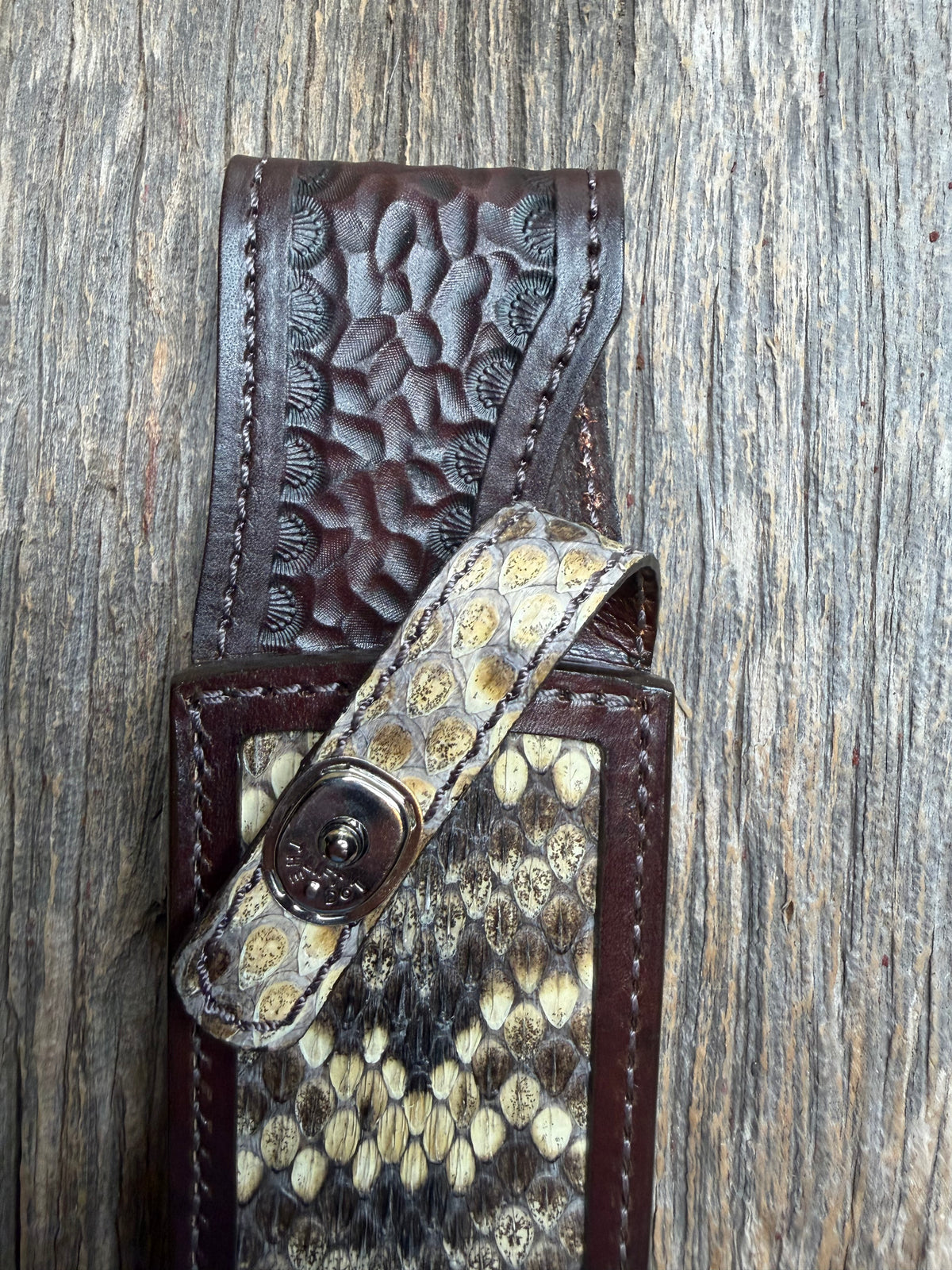 Randall Model 12-8 sheath with an Eastern Diamondback RattleSnake skin from Treeman Sheaths. Hand tooled belt loop, canteen snap. Vibrant colors and one of the hardest skins to source.
