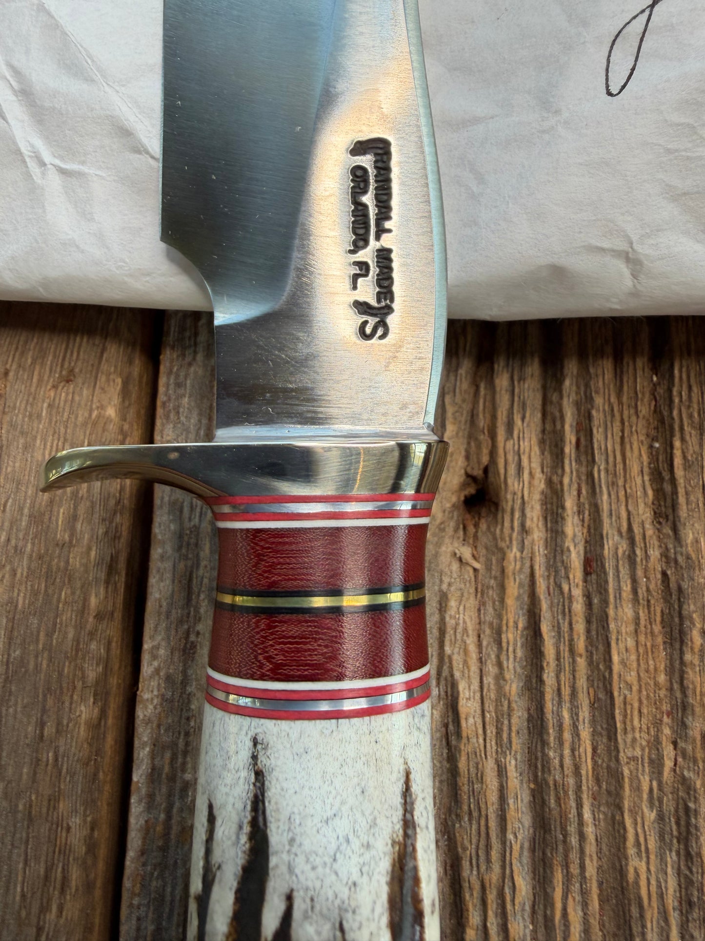 New in Paper Randall Made Knife Model 27-5 with a Stag handle, Stainless, Nickel silver single Hilt, red and aluminum spacers, loaded!!