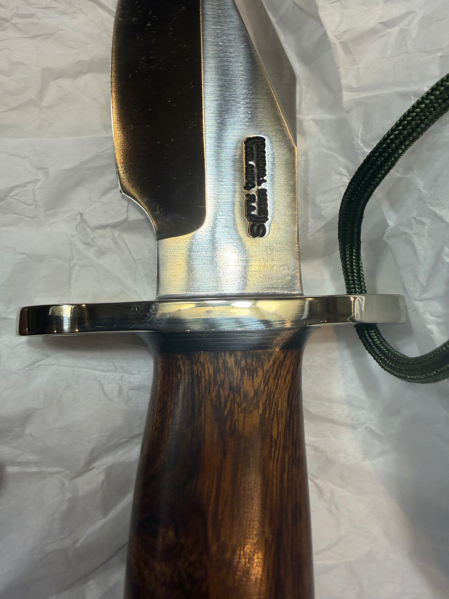 New in Paper Randall Model 19-5 with a nice piece of Ironwood. Nickel silver Hilt and Aluminum crows beak Butt cap.