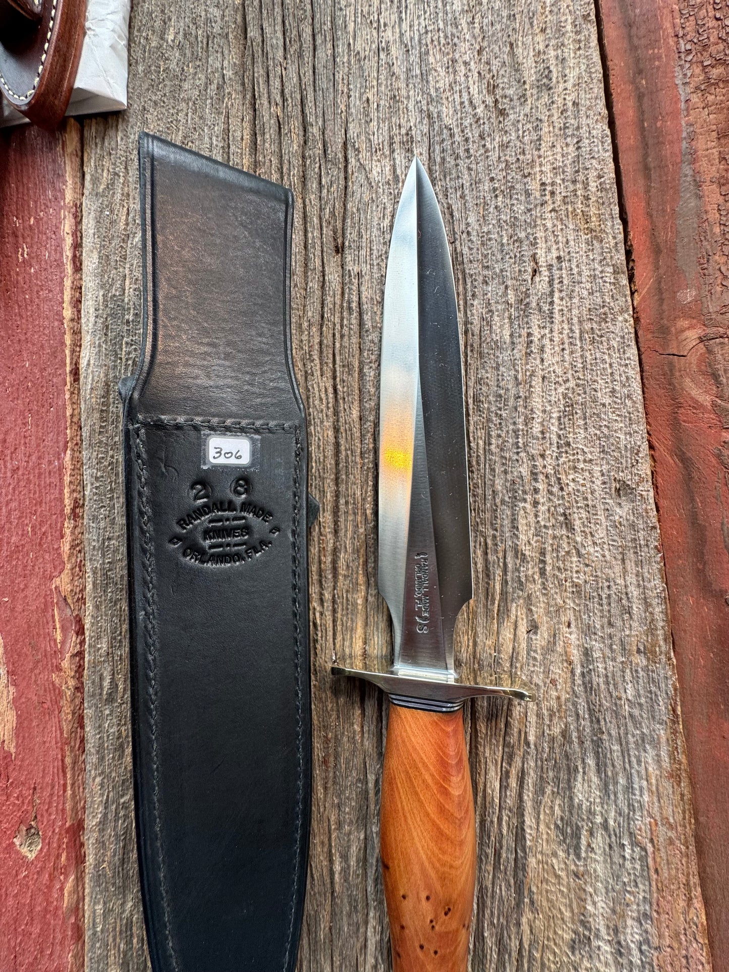 Like new Randall Model 2-8 Stainless steel blade, Nickel silver hilt and butt cap. Black leather sheath. Thuya wood handle.