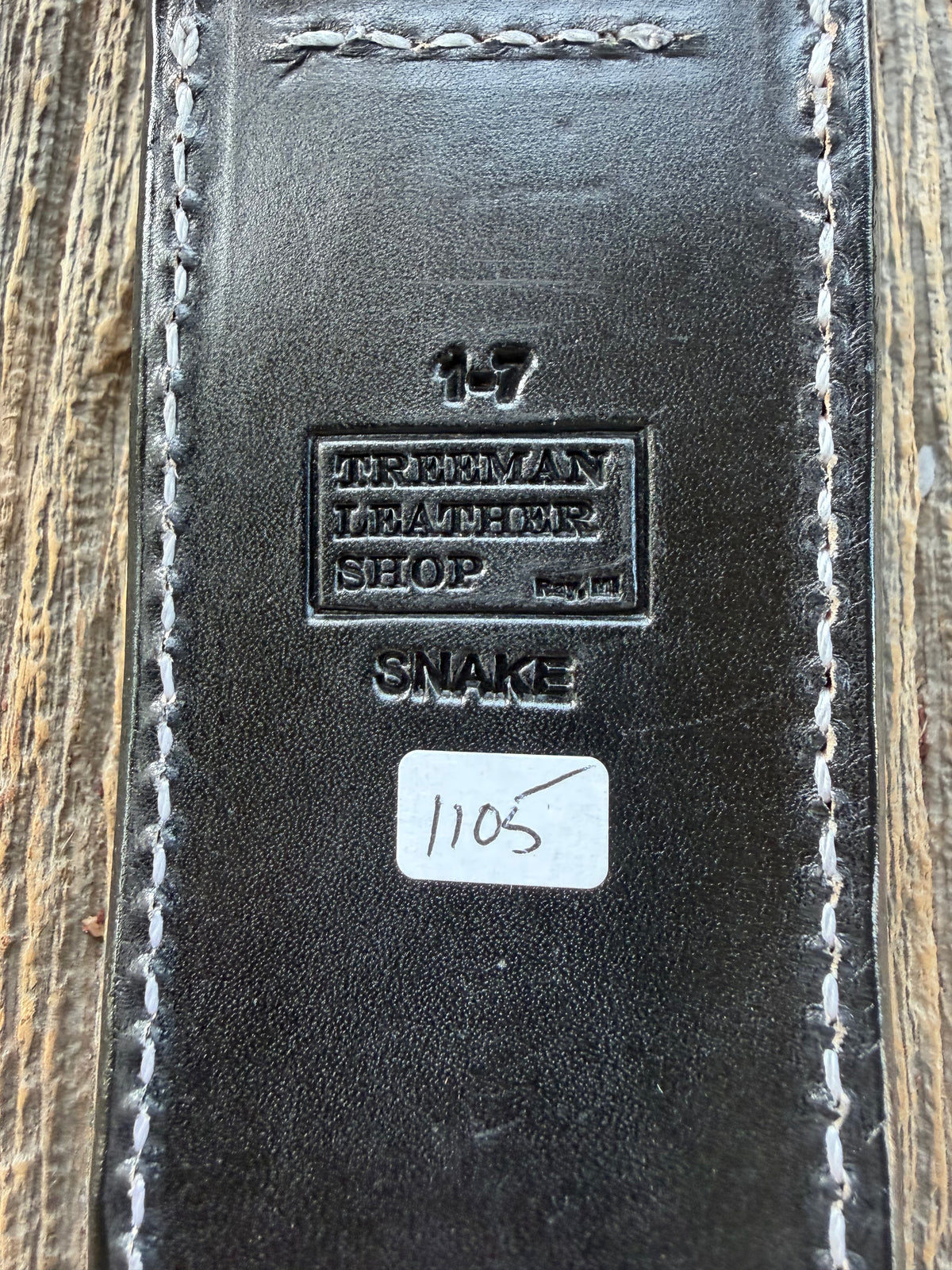 Randall Model 1-7 sheath with inlayed Western Diamondback RattleSnake skin from Treeman Sheaths. Brown leather, white deviated stitching and black canteen snaps.