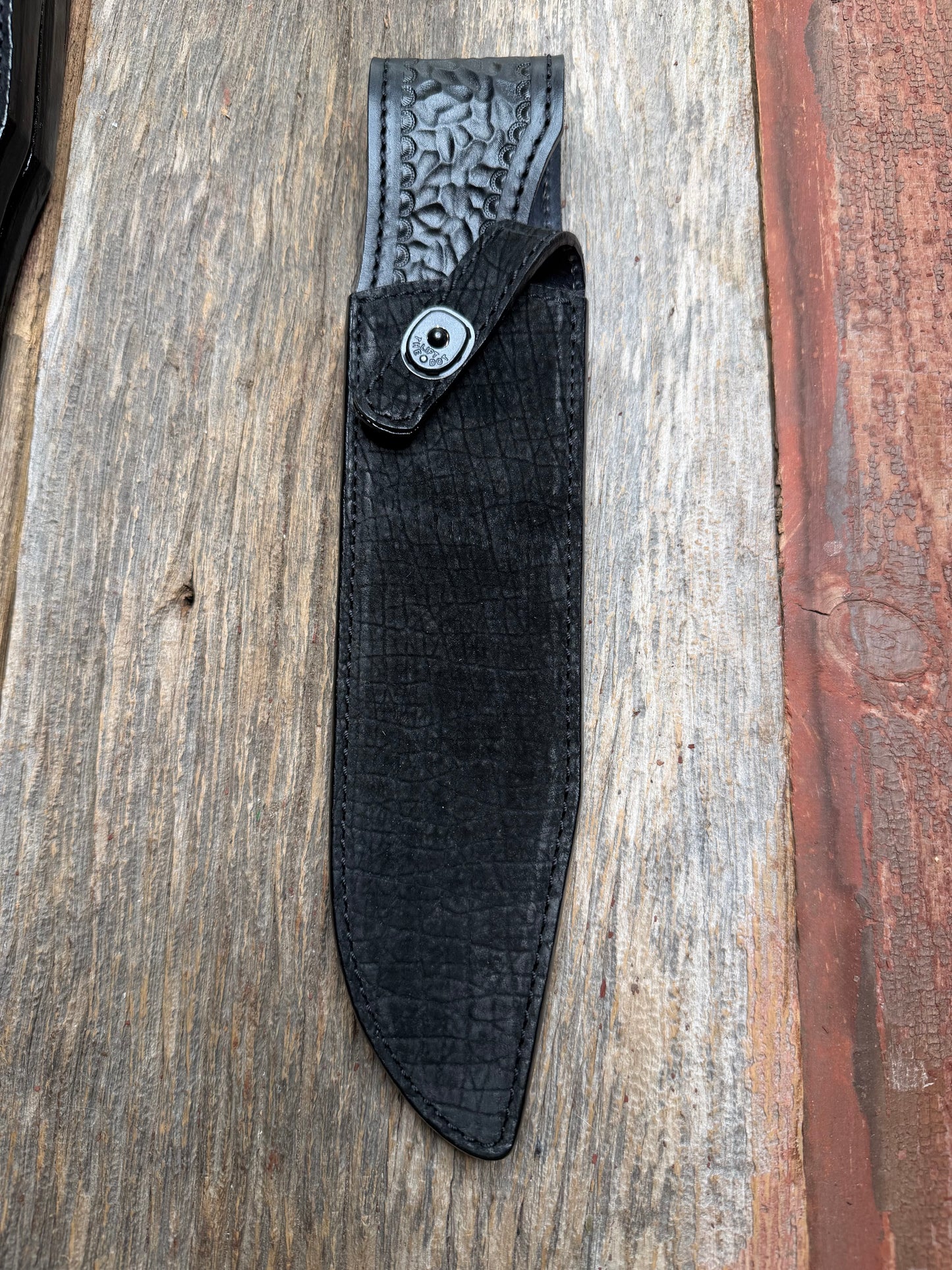 Randall Model 12-9 in Black Hippo, forward curved hilt, black Canteen Snap, full brass stamping and stitching.