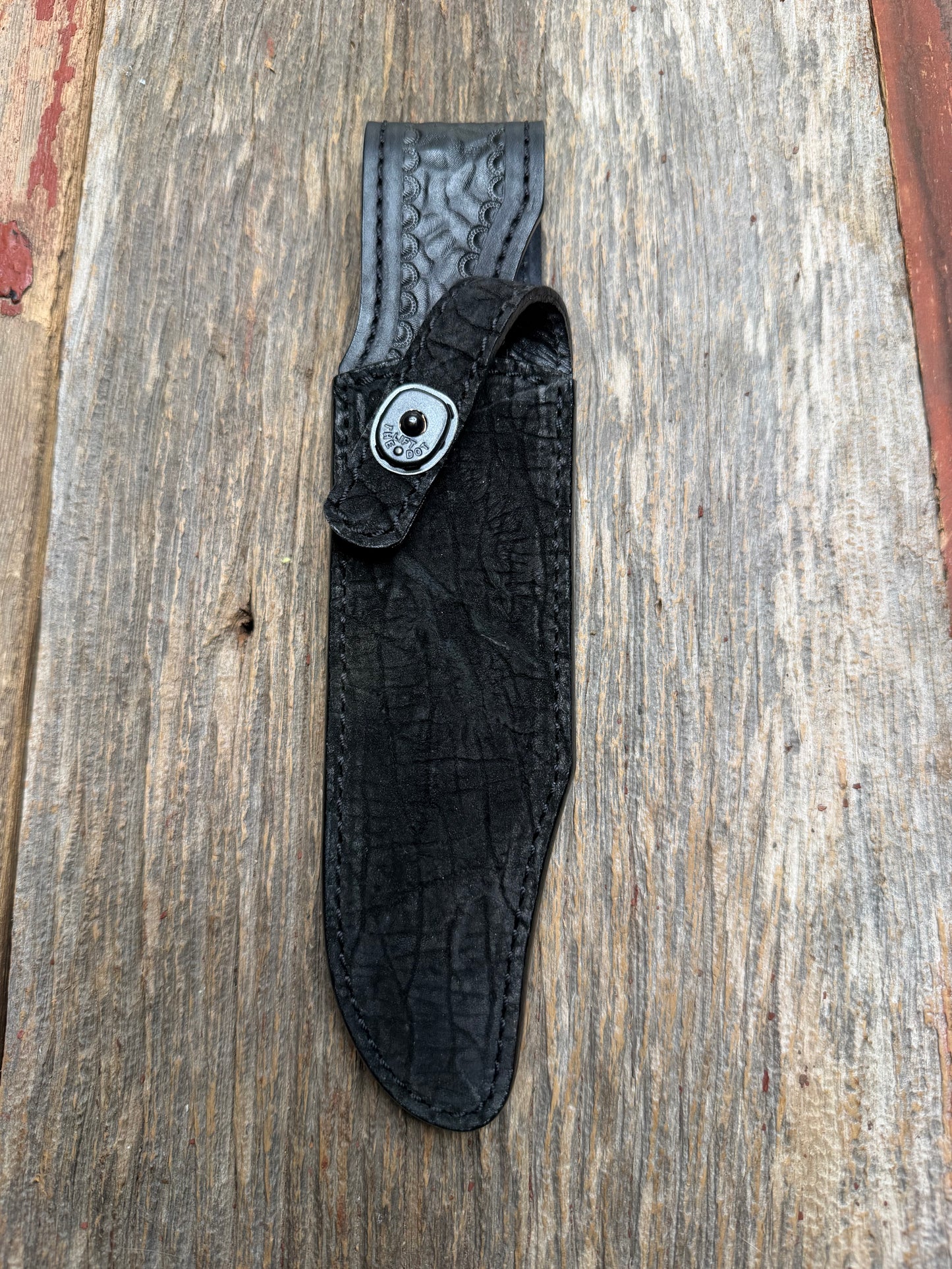 Randall Model Buxton Fighter in Black Hippo, forward curved hilt, black Canteen Snap, full brass stamping and stitching.