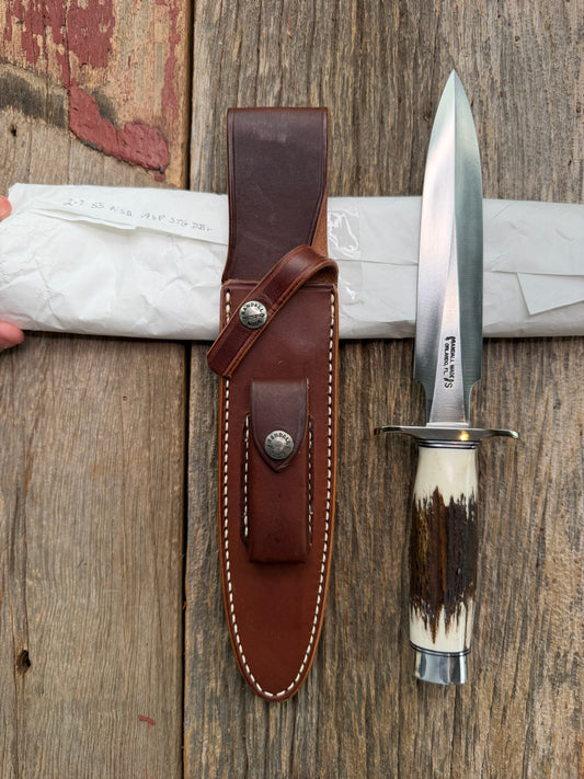 New in Paper Randall Made Knife Model 2-7 with a Stag handle, Stainless steel blade, Nickel silver Hilt, black and aluminum spacers, loaded!!