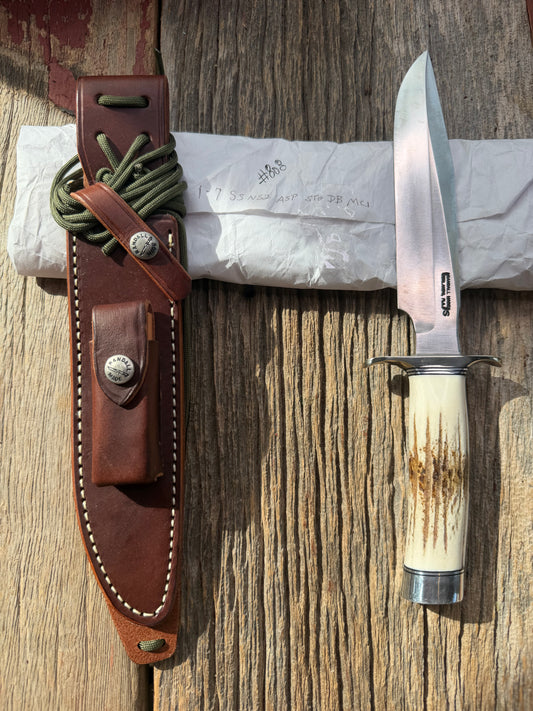 New in Paper Randall Made Knife Model 1-7 Stag , Stainless, Black and Aluminum spacers, Nickel Silver Hilt, Aluminum butt cap.