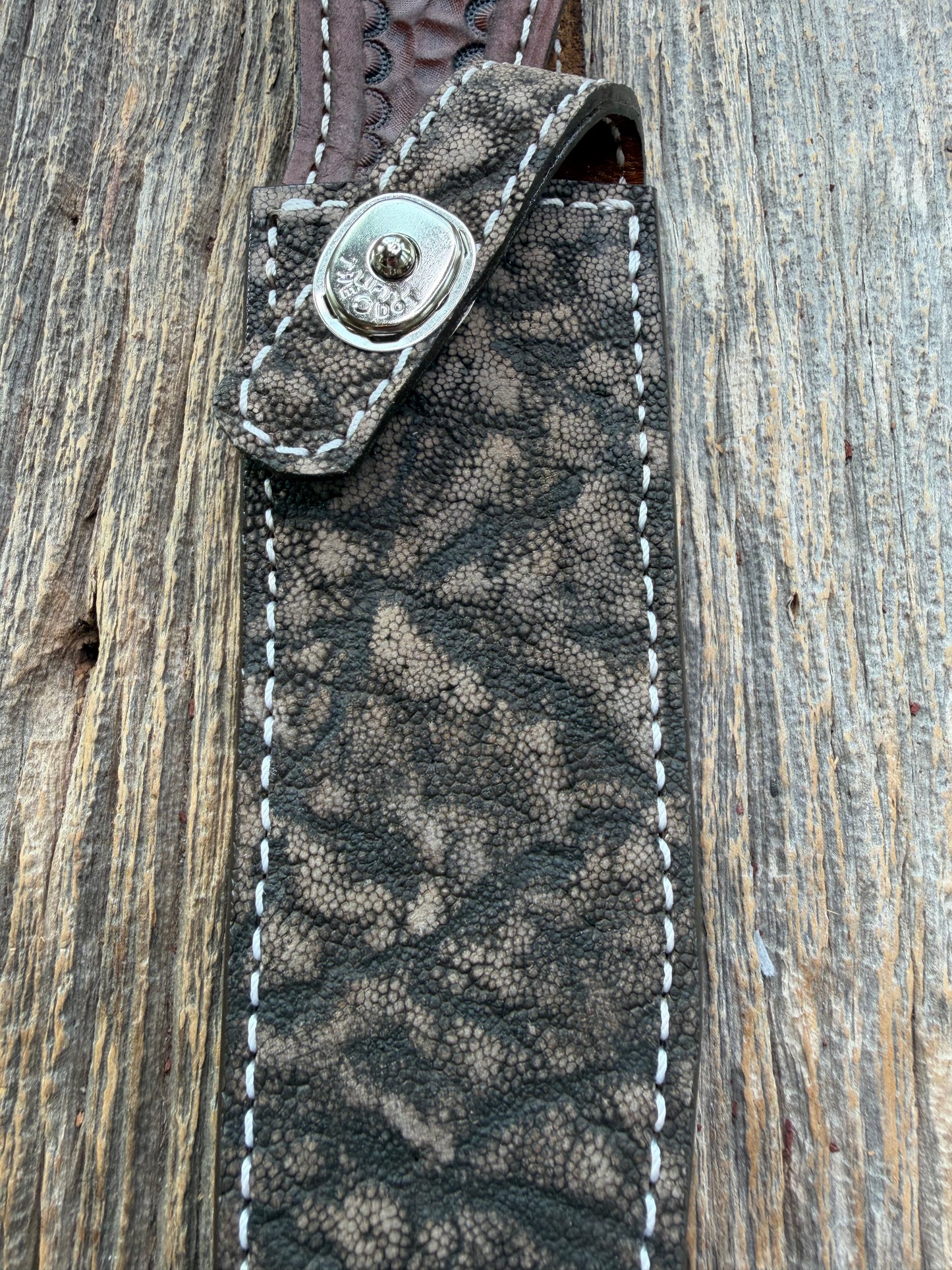 New Randall Model 1-7 Sheath in Exotic thick and textured Black and Grey Elephant Ear  on brown leather from Treeman with a silver Canteen snap. Hand tooled belt loop. Killer sheath.