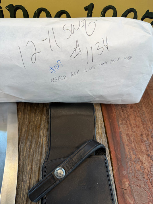 New in Paper Randall Model 12-11 Dealer Special Large Sasquatch Huge piece of Pearly White Fossil walrus Ivory, Finger Groves , # 1134 Nickel Silver Hilt and butt cap.