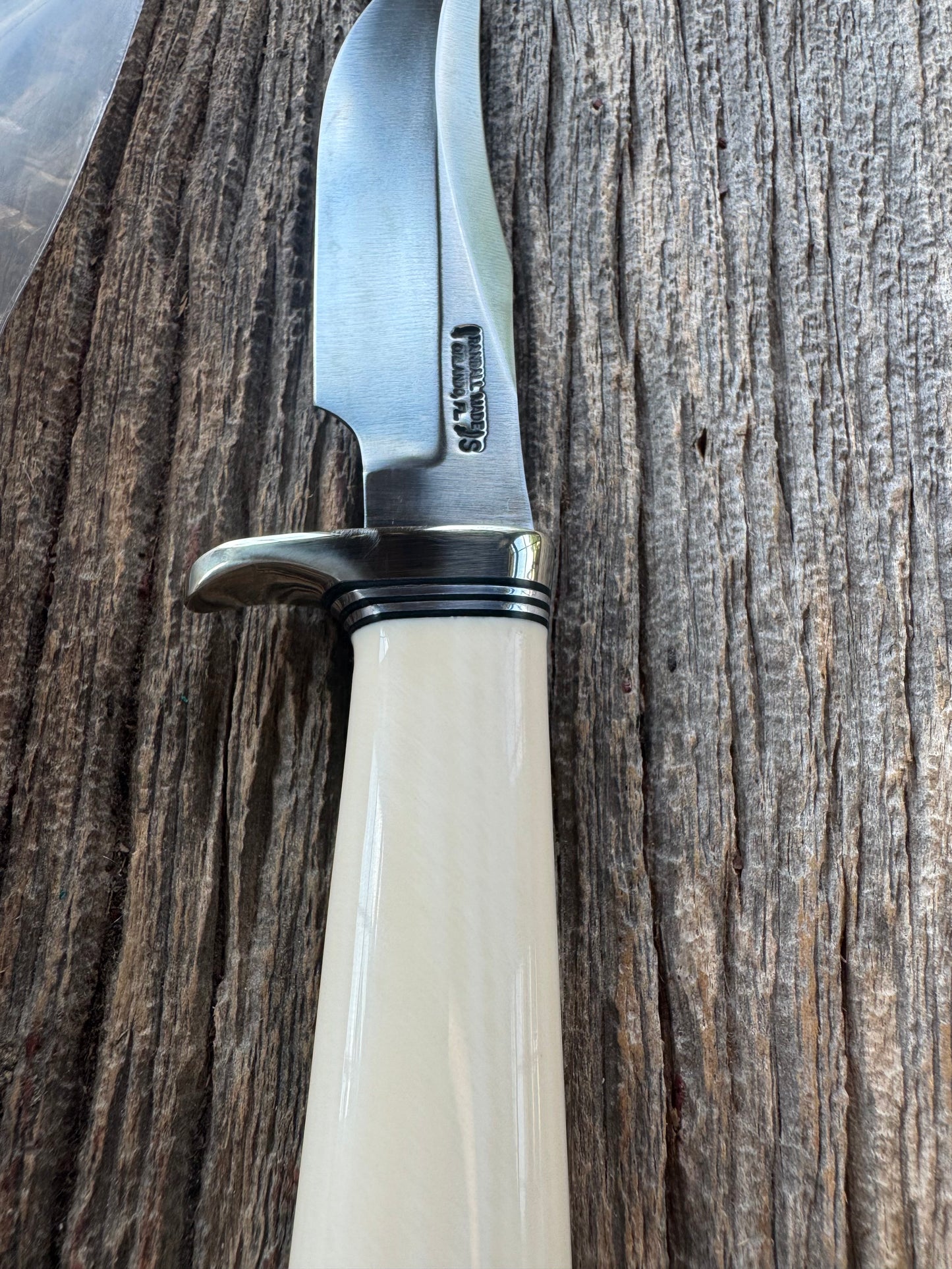 New in paper Randall Model 8-4 with a nice piece of customer supplied Dave Warthers Resin, Stainless Steel, Nickel Silver Single Hilt and butt cap.