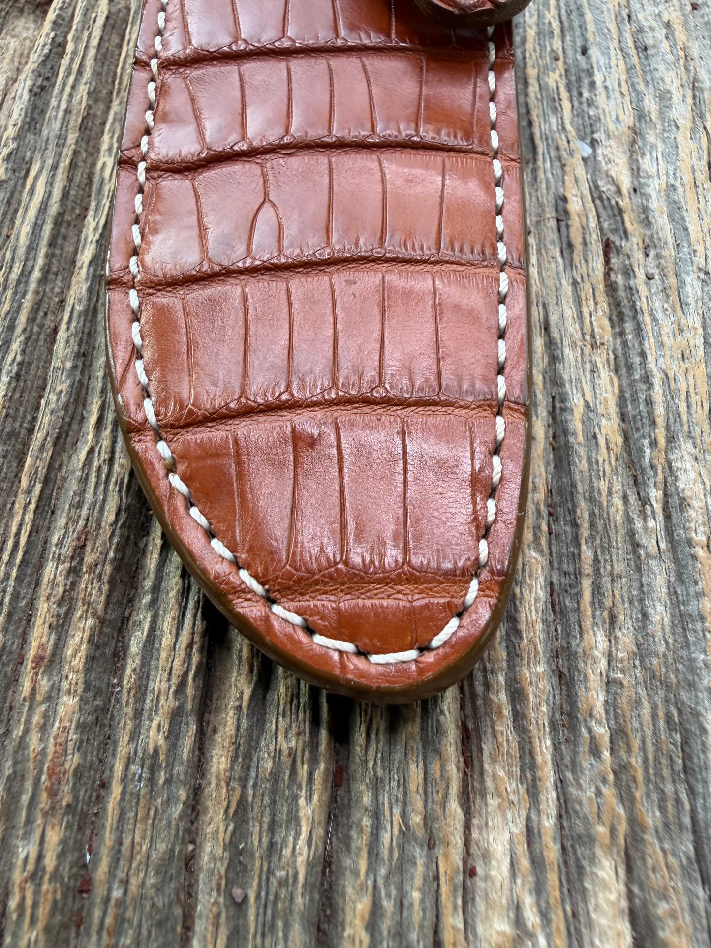New Randall Model 23 Sheath in Exotic thick and textured Honey Crocodile skin on brown leather from Treeman with a silver Canteen snap. Hand tooled belt loop. Killer sheath.