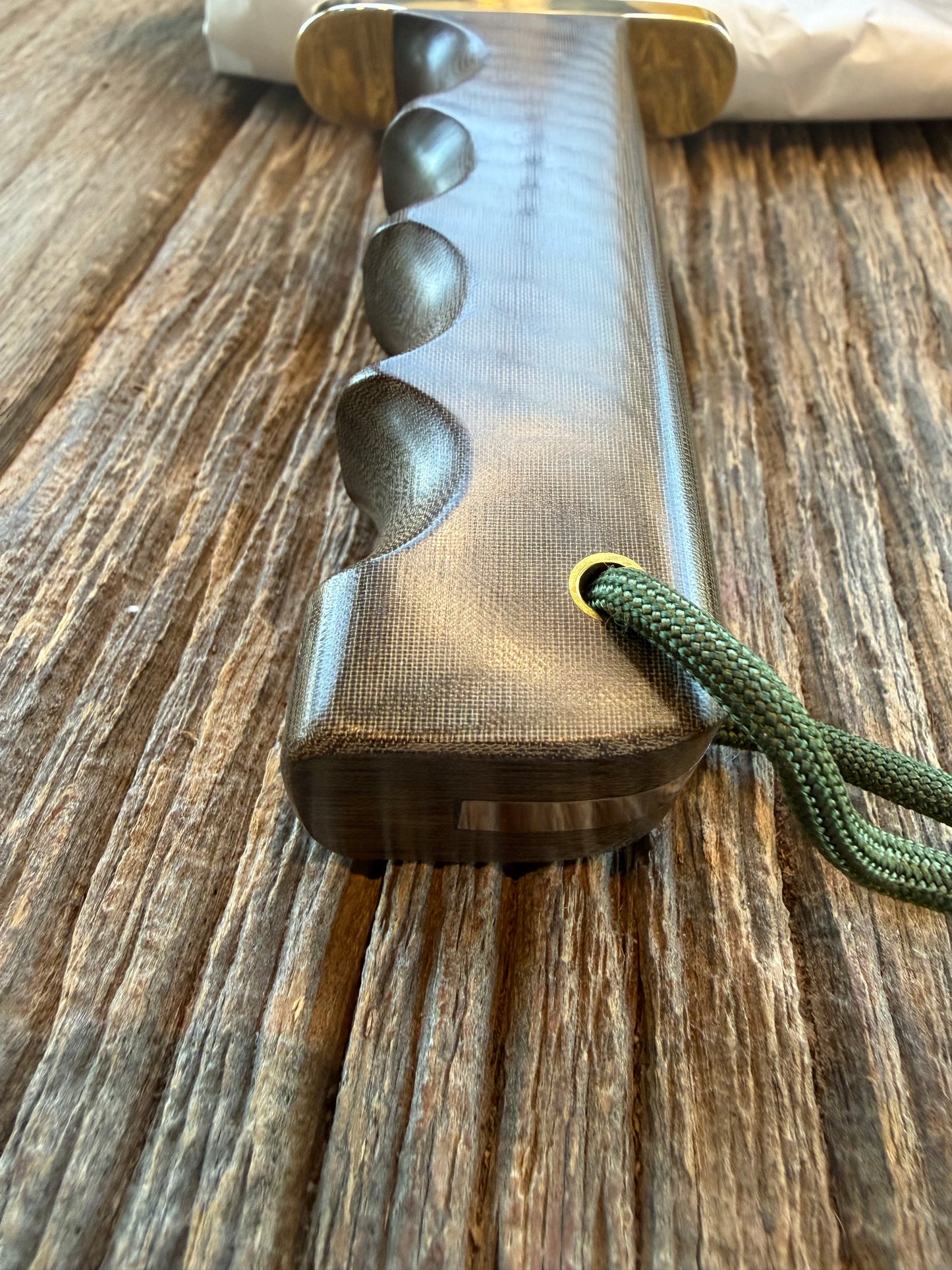 New in Paper Randall Model 16 SP#1 Special fighter with a Green Micarta handle. SS blade, Nickel silver hilt. Lanyard. Brown leather sheath.