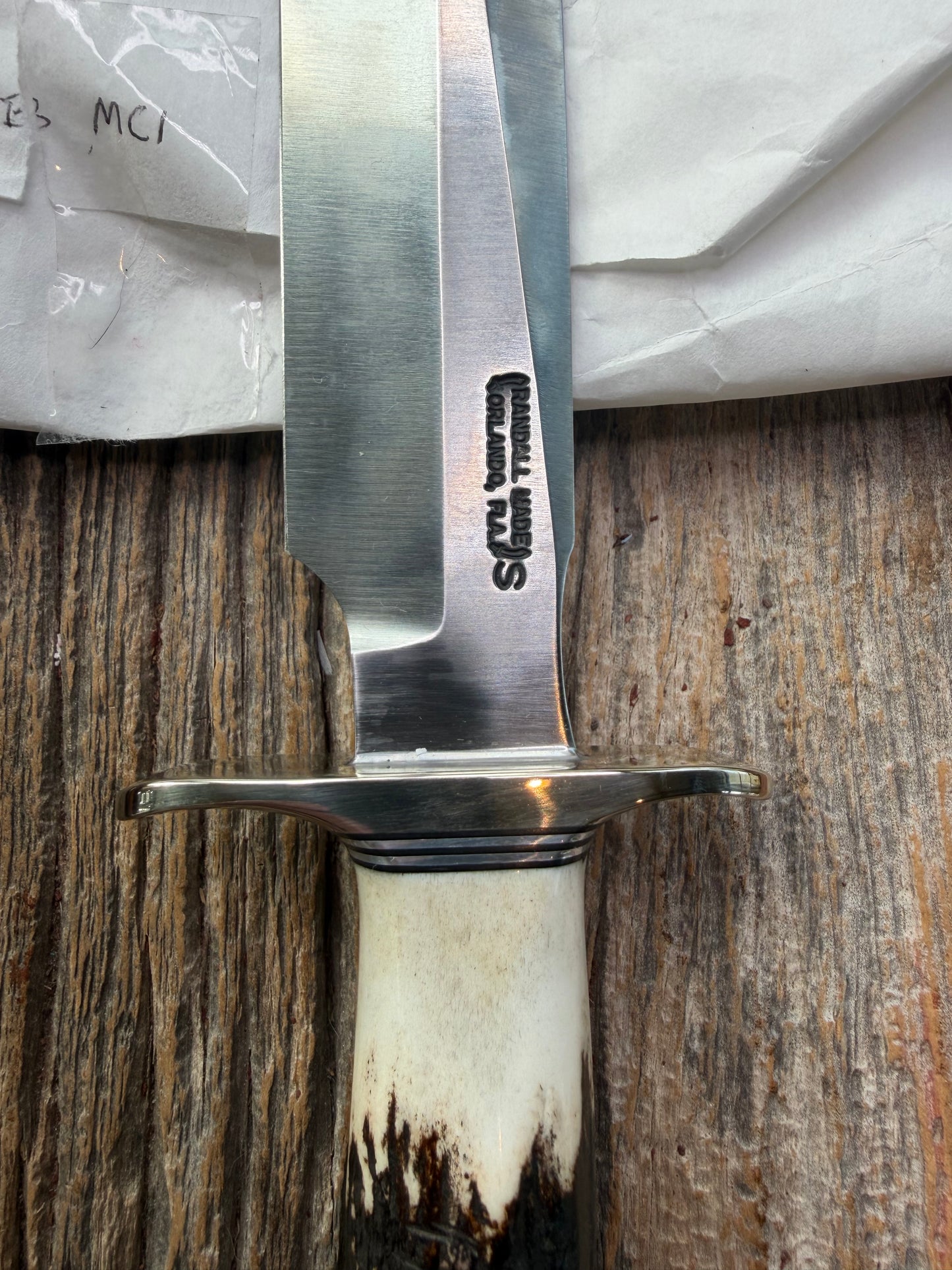 New in Paper Randall Made Knife Model 1-7 Stag , Stainless, Black and Aluminum spacers, Nickel Silver Hilt, Aluminum crows beak butt cap.