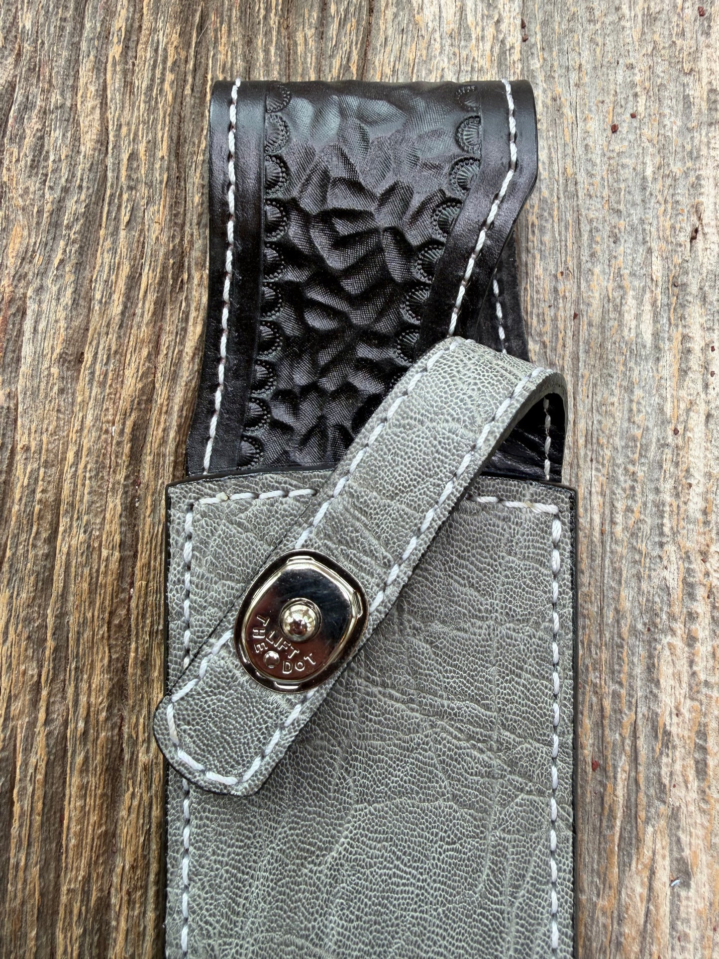 New Randall Model 12-8 Big Bear Sheath in Exotic thick and textured Grey Elephant Hide on black leather from Treeman with a silver Canteen snap. Hand tooled belt loop. Killer sheath.