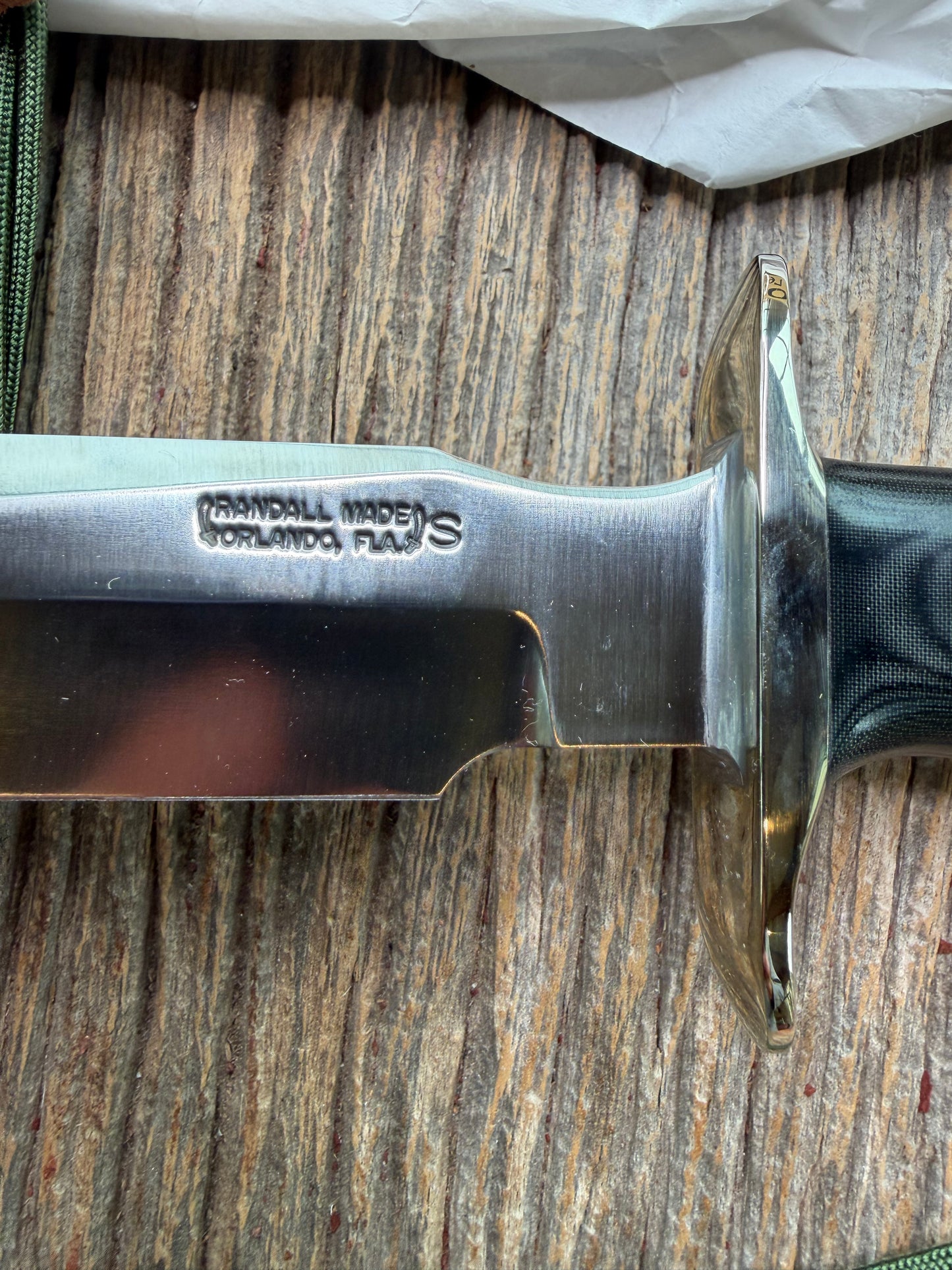 New in Paper Randall Model 16 SP#1 Special fighter with a Black Micarta handle. SS blade, Nickel silver hilt. Lanyard. Brown leather sheath.