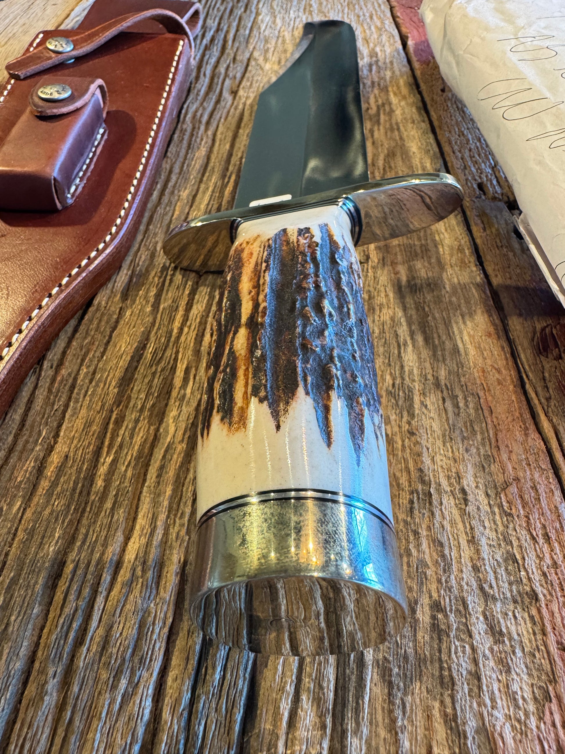 New in Paper Randall Model 12-11 Smithsonian “Smitty” in a Huge piece of Popcorn Stag. Nickel Silver Hilt and Butt cap.