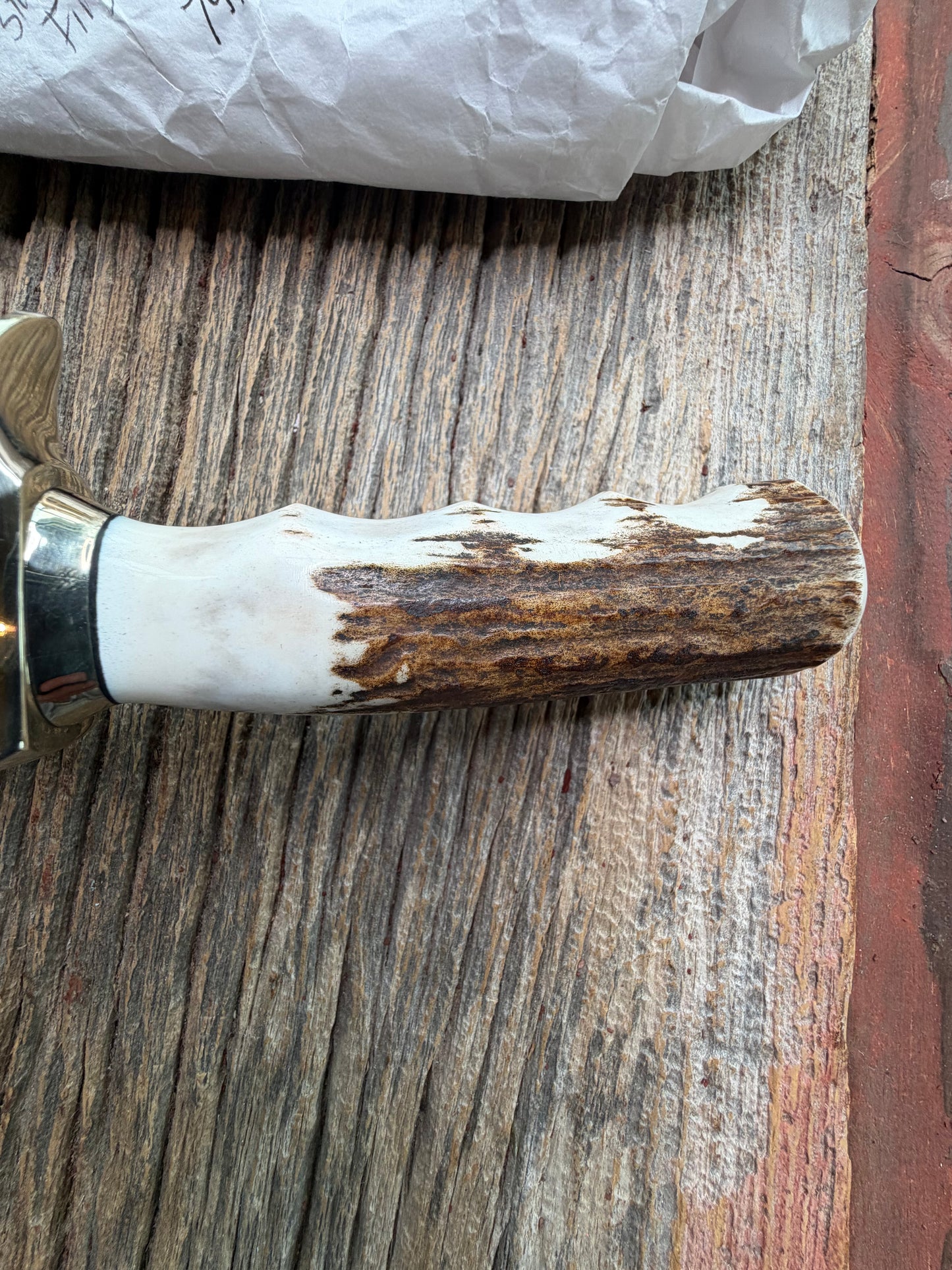New in Paper Randall Model 19-5 with a nice Stag finger grooves handle. Nickel silver Single Hilt a Nickel silver collar, natural end, Stainless steel blade.