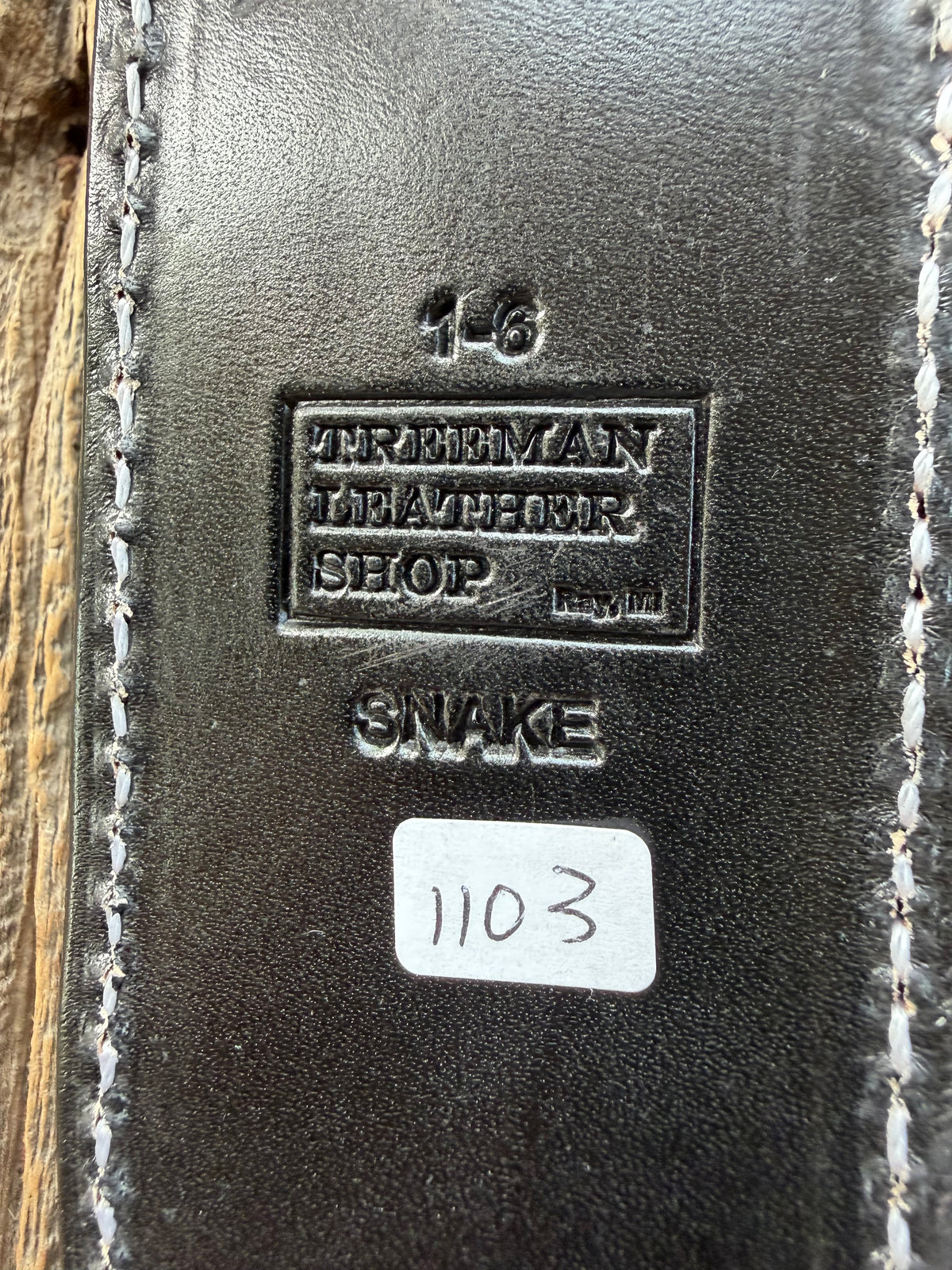 Randall Model 1-6 sheath with inlayed Western Diamondback RattleSnake skin from Treeman Sheaths. Brown leather, white deviated stitching and black canteen snaps.