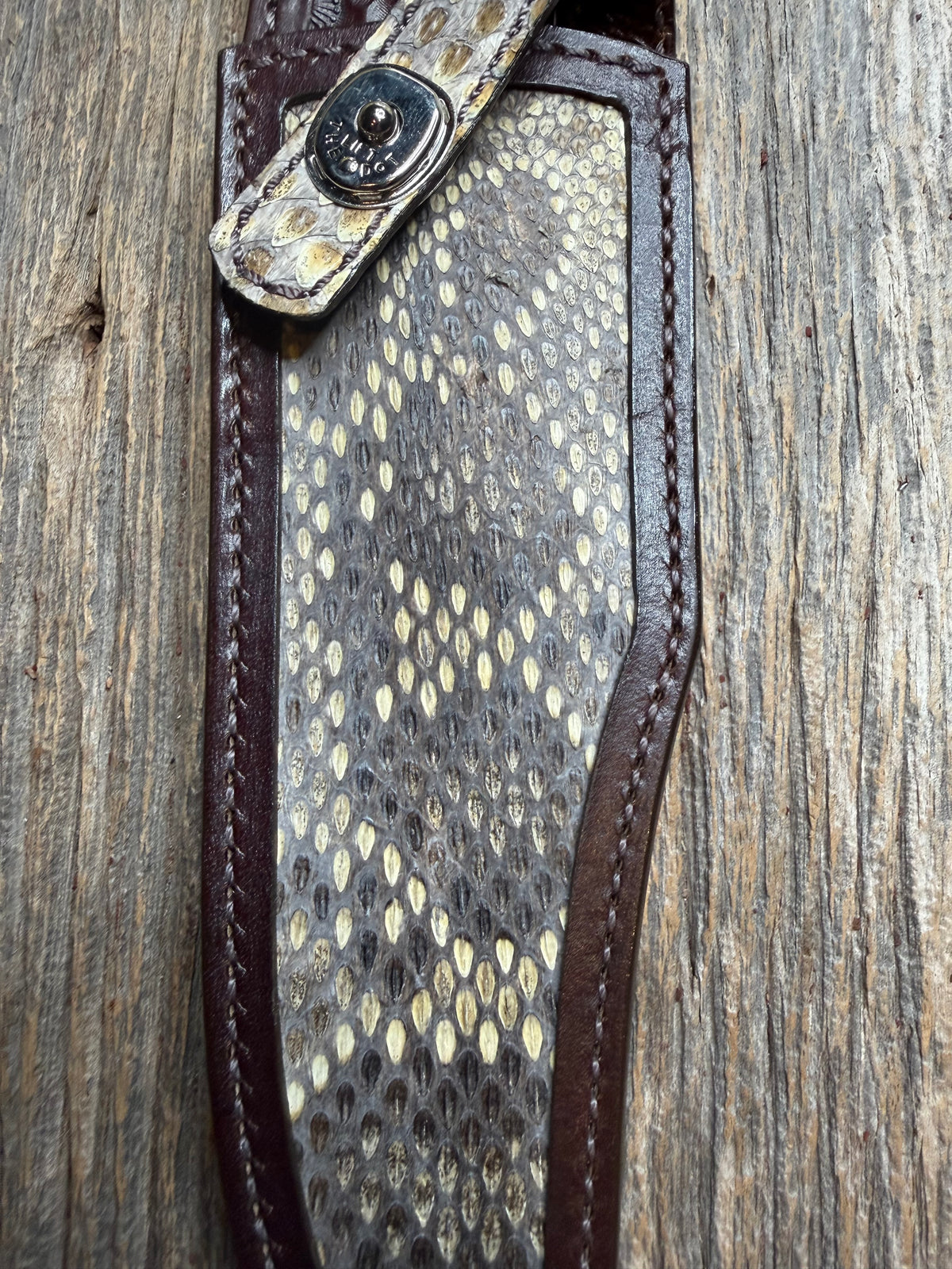 Randall Model 12-8 sheath with an Eastern Diamondback RattleSnake skin from Treeman Sheaths. Hand tooled belt loop, canteen snap. One of the hardest skins to source.