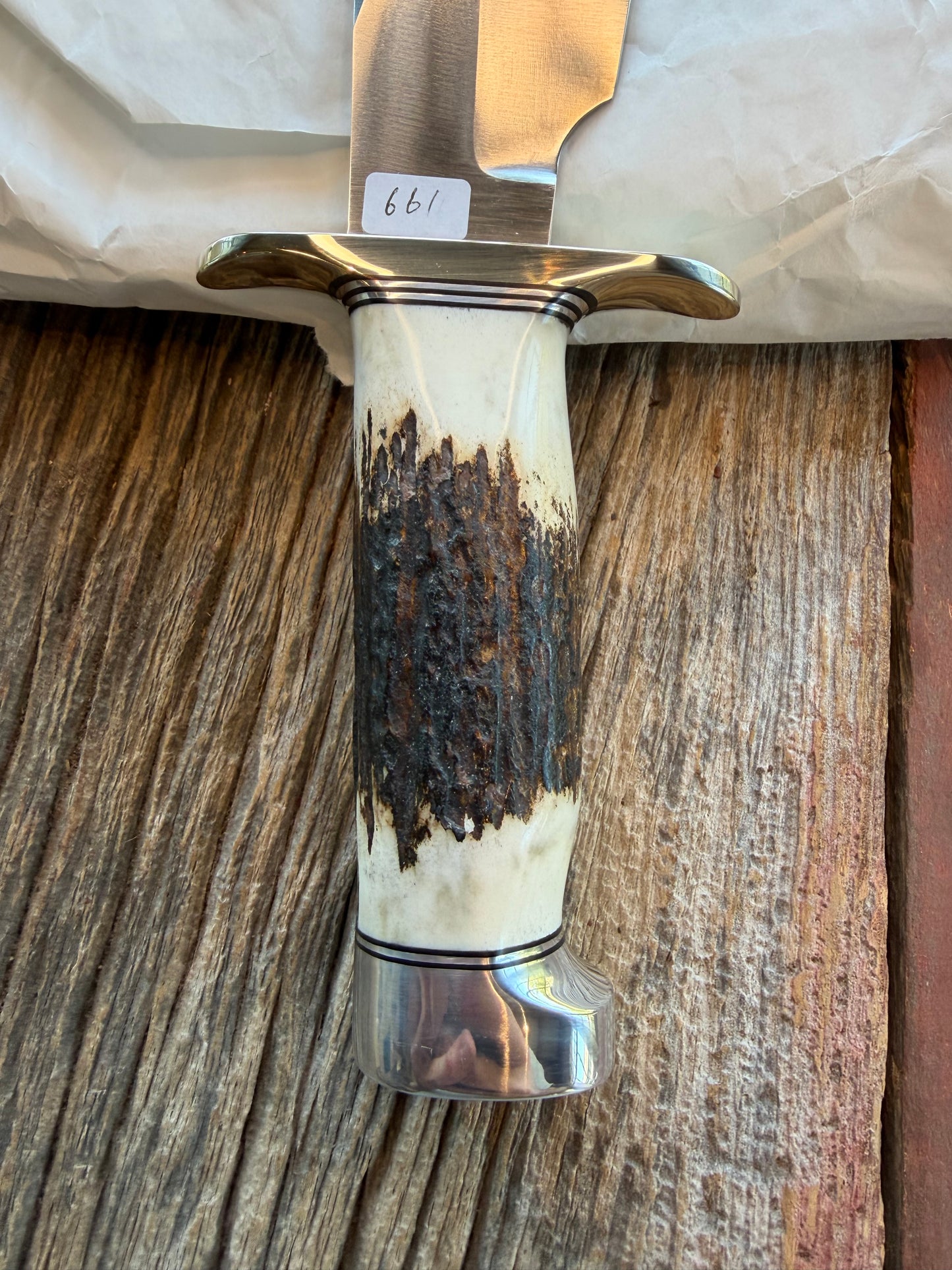 New in Paper Randall Model 19-5 with a Gnarly piece of Stag. Nickel silver Hilt and Aluminum crows beak Butt cap.