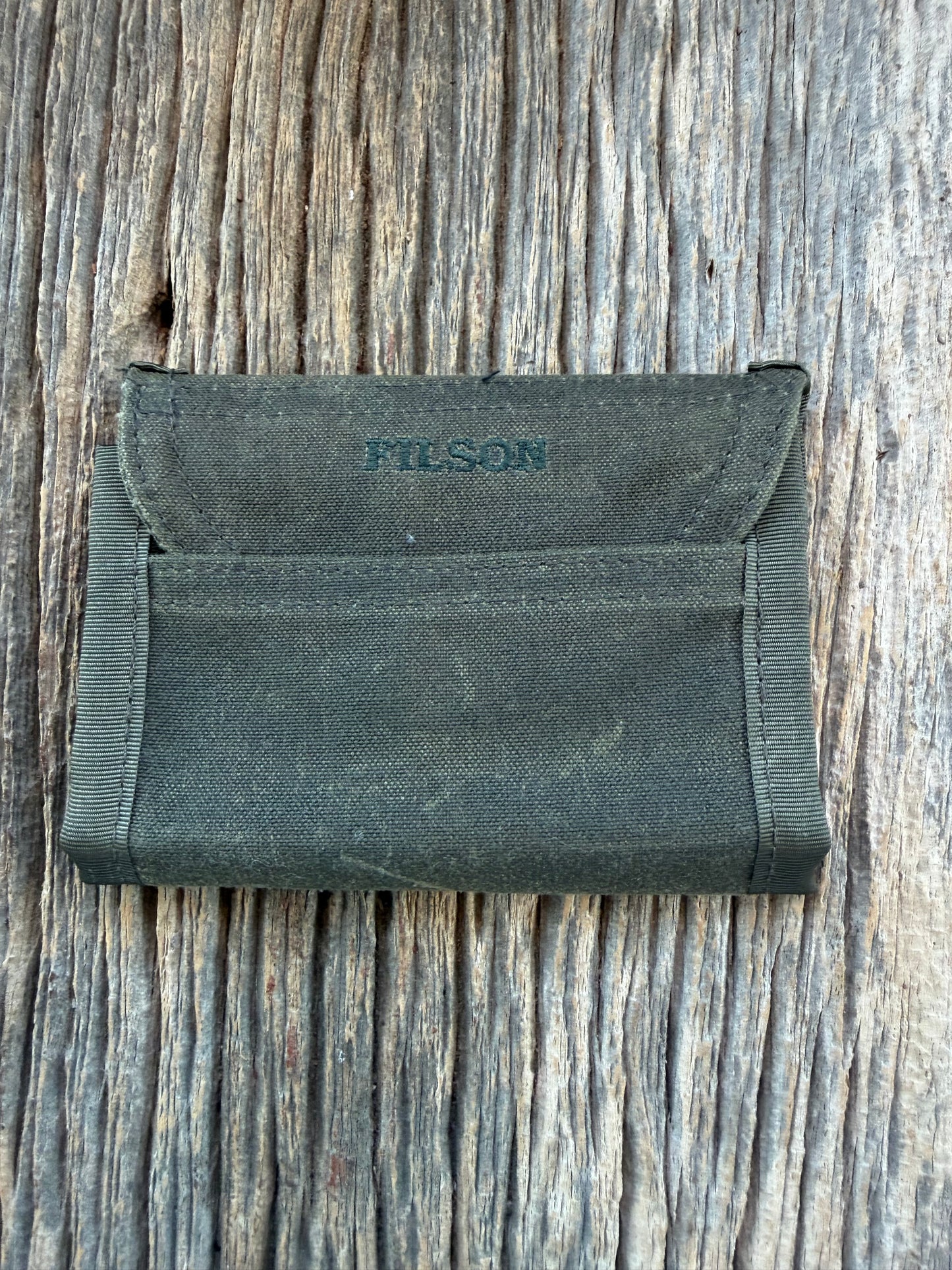 Adding to cart will not result in a sale. Personal Collection..Rare New with Tags Filson Oil Tin Cloth Tri Fold Wallet in Otter Green # 11069150 from February 2016.