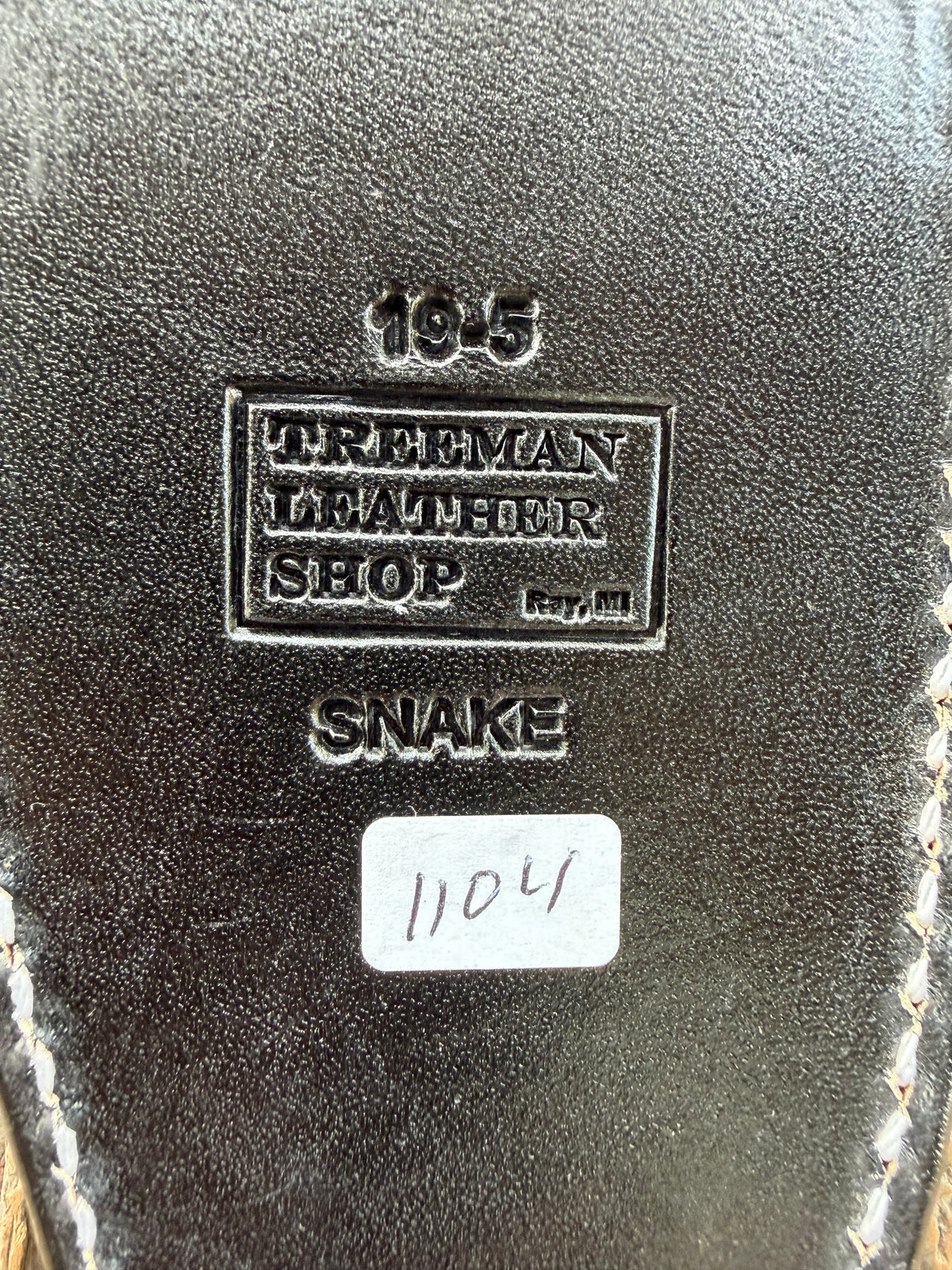 Randall Model 19-5 sheath with inlayed Western Diamondback RattleSnake skin from Treeman Sheaths. Brown leather, white deviated stitching and black canteen snaps.