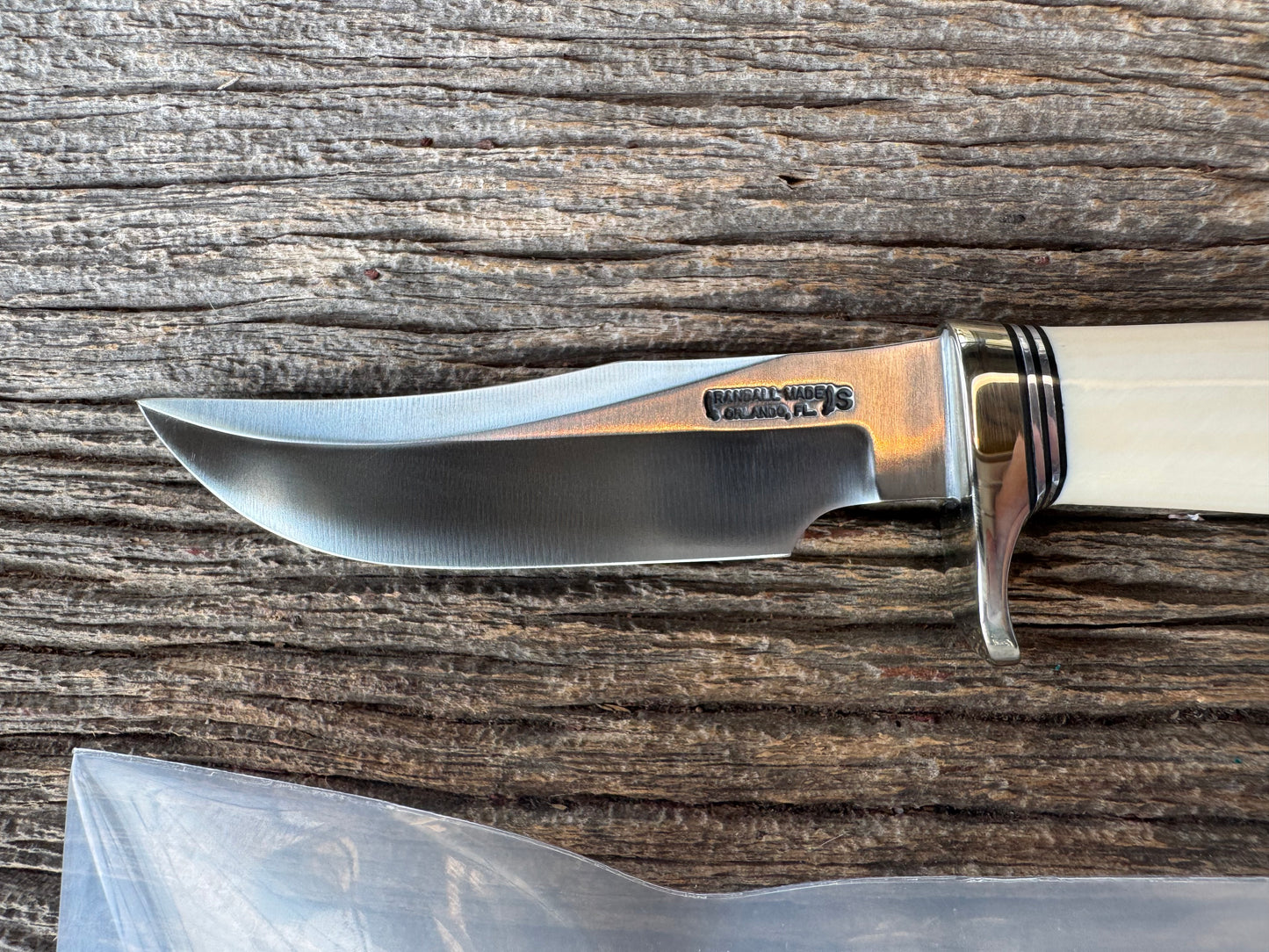 New in paper Randall Model 8-4 with a nice piece of customer supplied Dave Warthers Resin, Stainless Steel, Nickel Silver Single Hilt and butt cap.