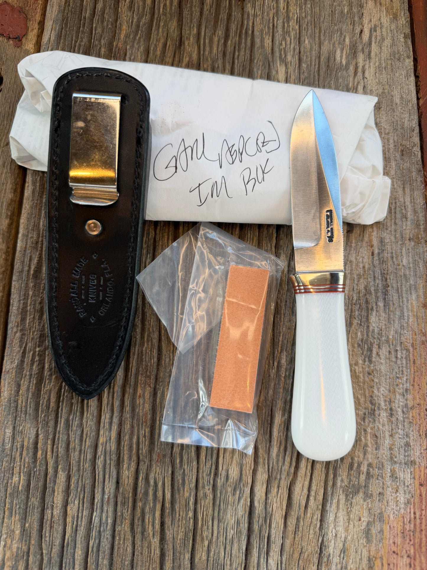 New in Paper Randall Model “Gambler” 4 Inch in Ivorite Nickel hilt, Stainless, red and Aluminum spacers.