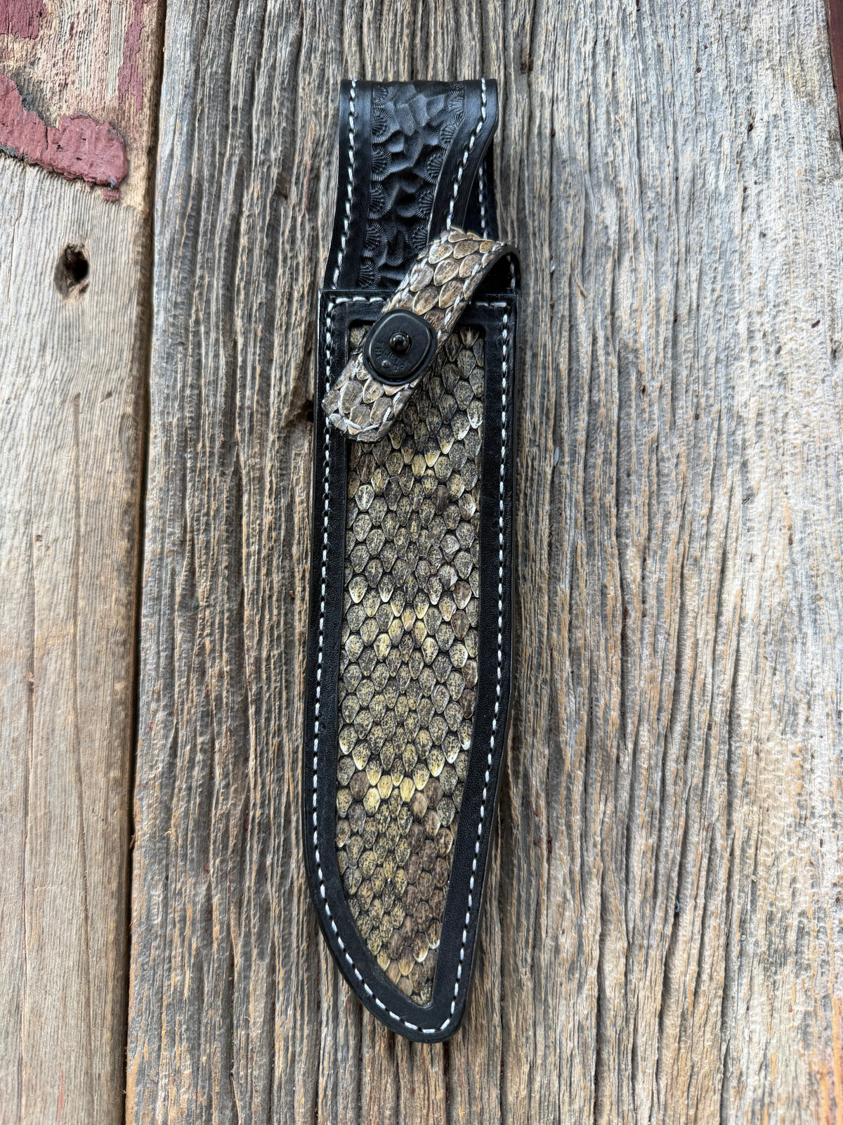 Randall Model 1-8 sheath with inlayed Western Diamondback RattleSnake skin from Treeman Sheaths. Brown leather, white deviated stitching and black canteen snaps.