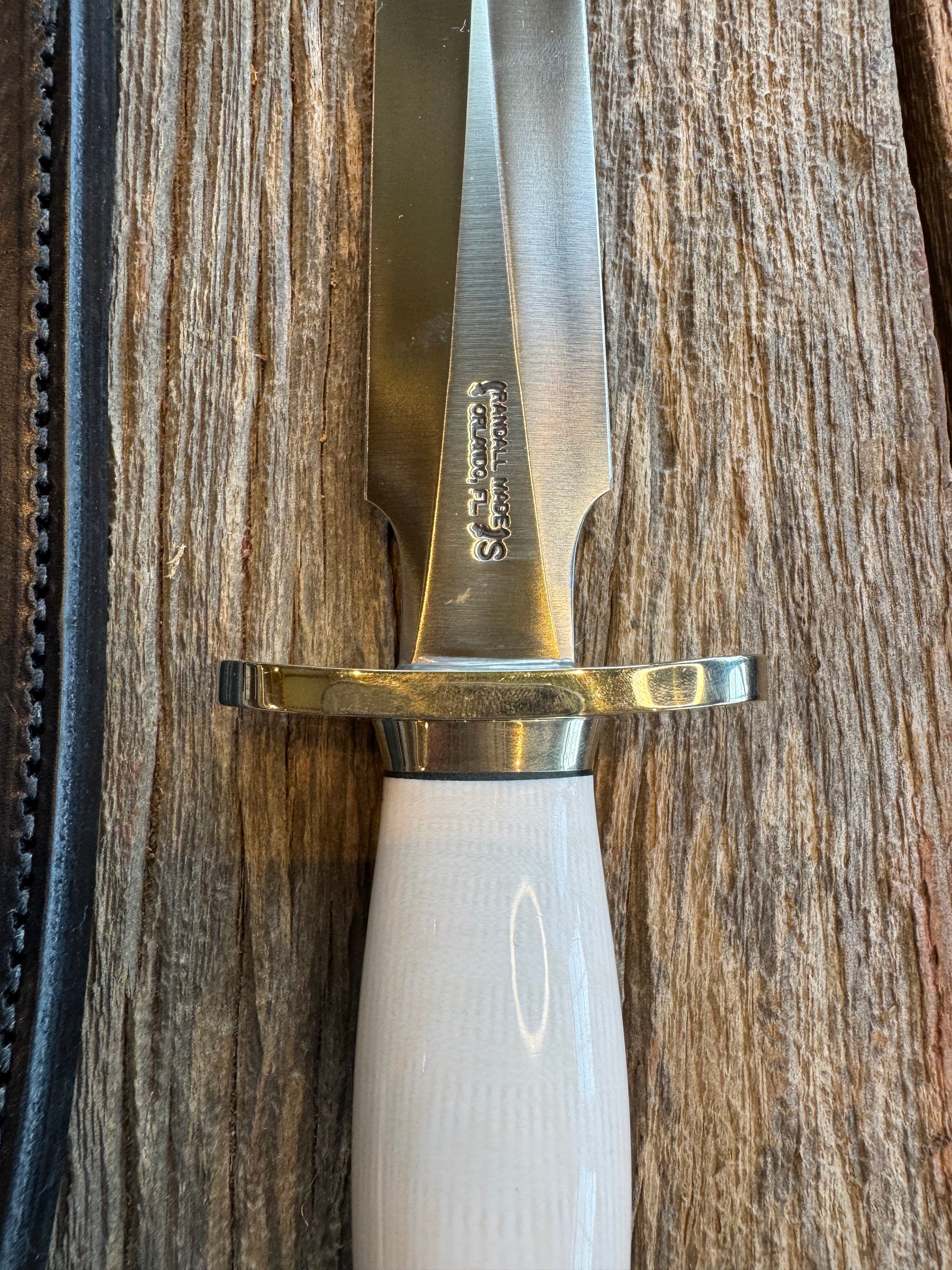 New Randall Knife Model 2-8 Warther Resin Ivory. Nickel Silver Hilt plus collar. Stainless Steel Blade, flanged butt cap.