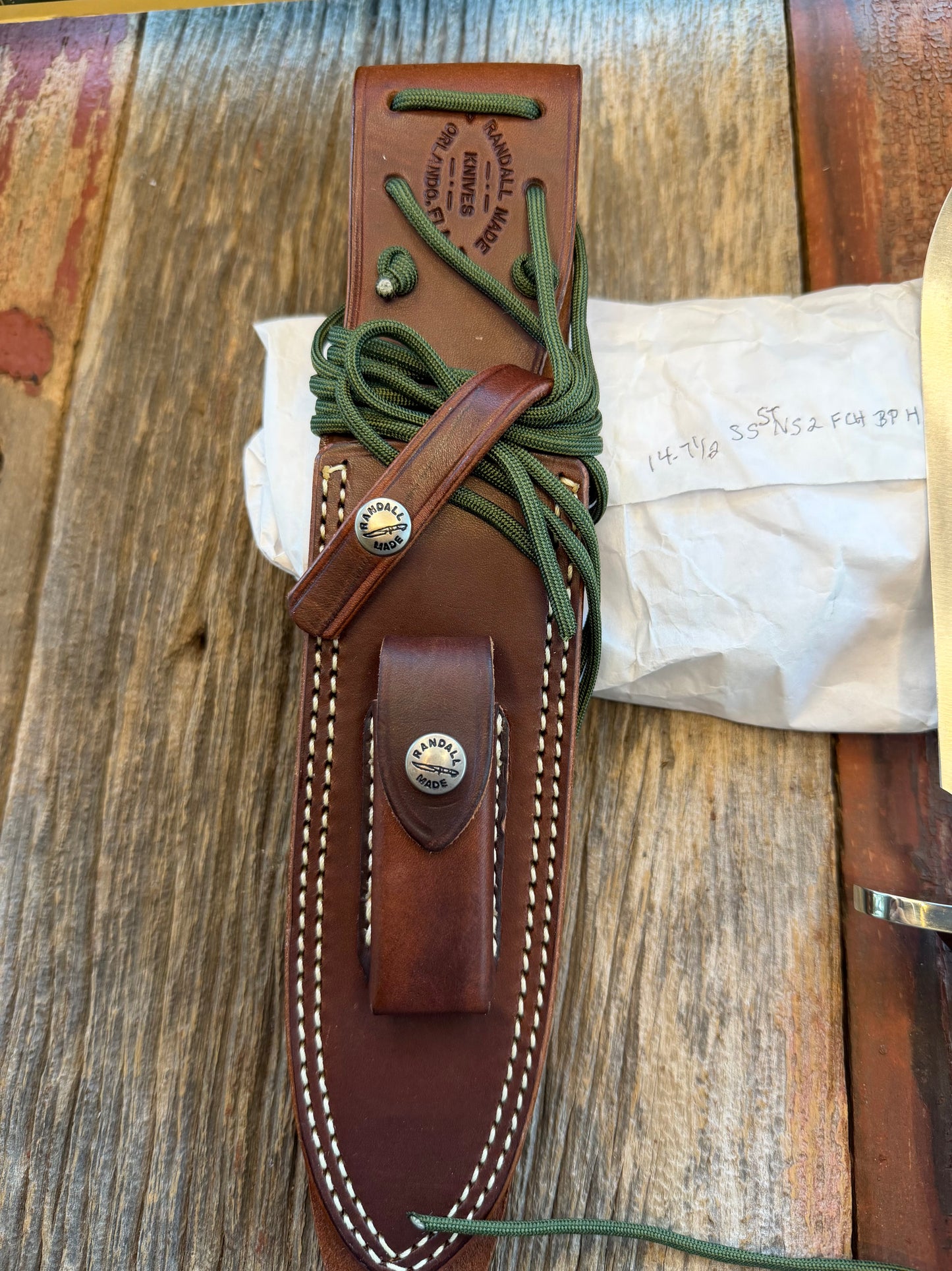 New in Paper Randall Model 14-7.5 in Black Micarta handle, Nickel Silver Hilt, Stainless steel, Sawteeth and Lanyard.