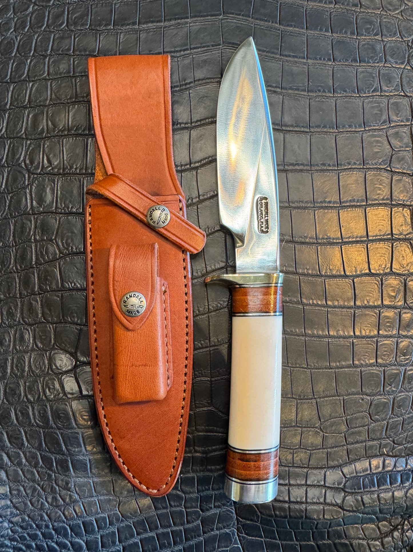Randall Model 25-6 in Elephant Ivory with stacked Leather, Nickel Silver Hilt and Aluminum Butt cap. Flawless.