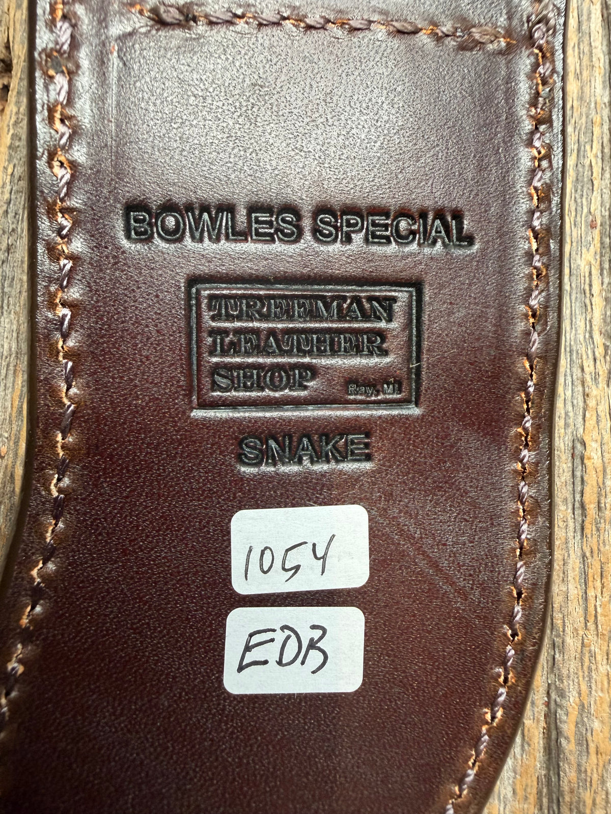 Randall Model Bowles Special sheath with an Eastern Diamondback RattleSnake skin from Treeman Sheaths. Hand tooled belt loop, canteen snap. Vibrant colors and one of the hardest skins to source.